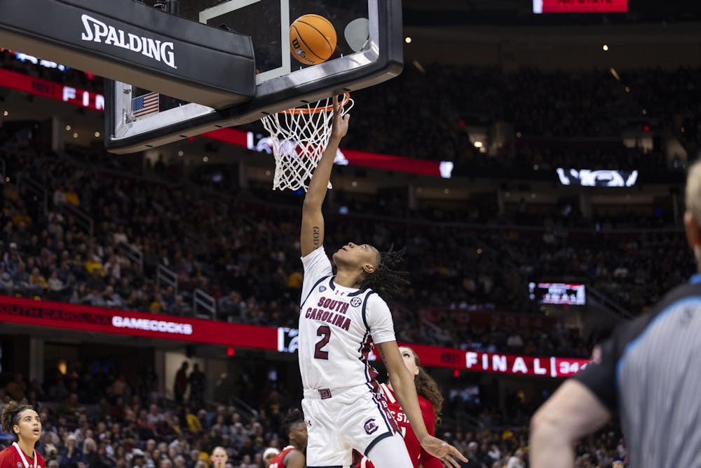 <p>FILE — Sophomore forward Ashlyn Watkins goes up for a layup in the semifinal matchup against NC State on April 5, 2024. The Gamecocks defeated the Wolfpack 78-59.</p>