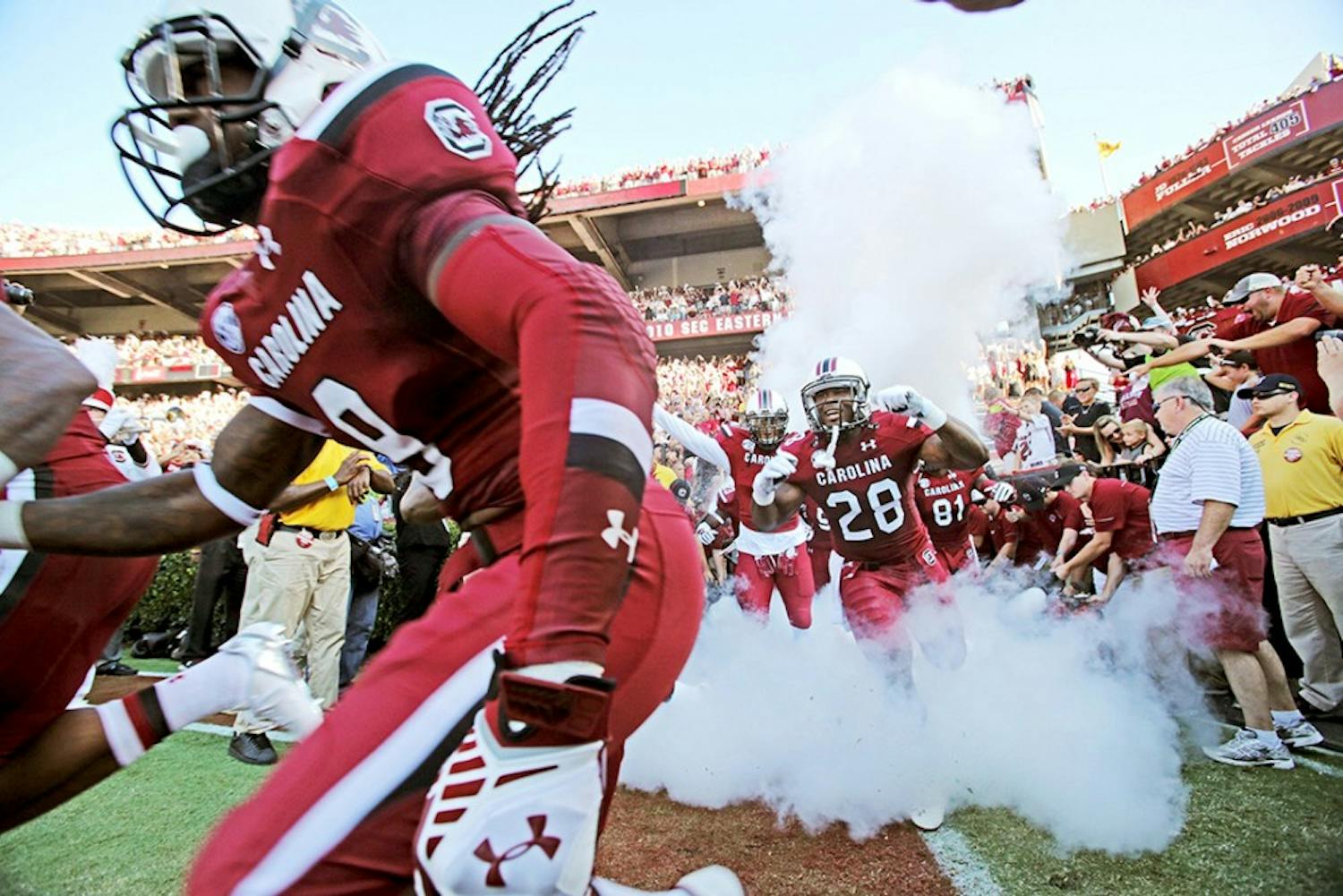 South Carolina running back Mike Davis (28) and the rest of the Gamecocks head onto the field prior to the start of action against Texas A&amp;M at Williams-Brice Stadium in Columbia, S.C., on Thursday, Aug. 28, 2014. (Gerry Melendez/The State/MCT)
