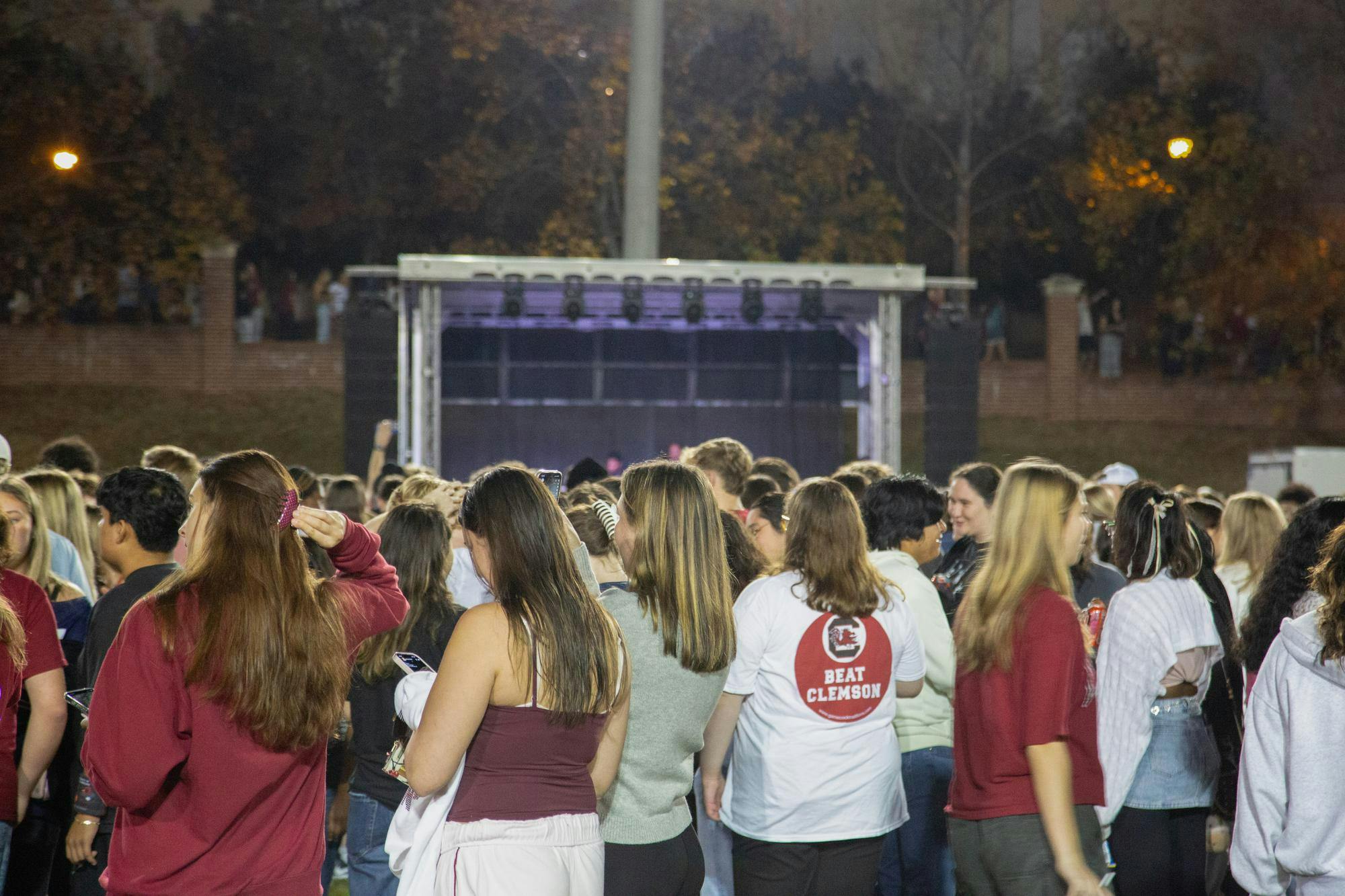 Students socialize and listen to music at Blatt Field while they wait for the Tiger Burn to begin on Nov. 19, 2025. The event occurs every year as part of the USC vs. Clemson rivalry.