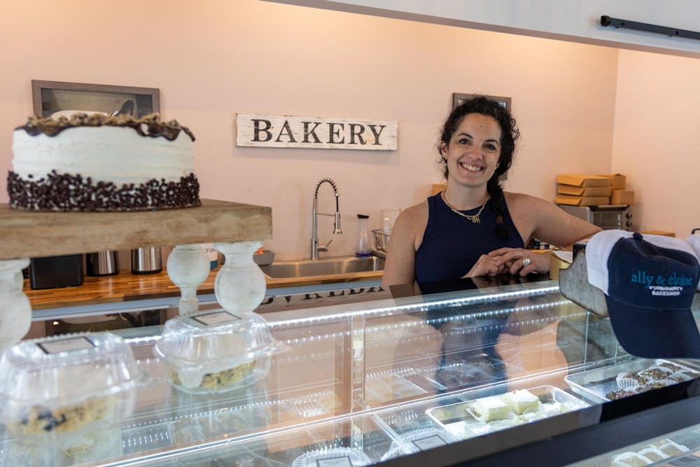 <p>The owner of Ally &amp; Eloise, Aleka Selig, poses for a photo inside the bakery. Selig opened the bakery in April of 2012.</p>