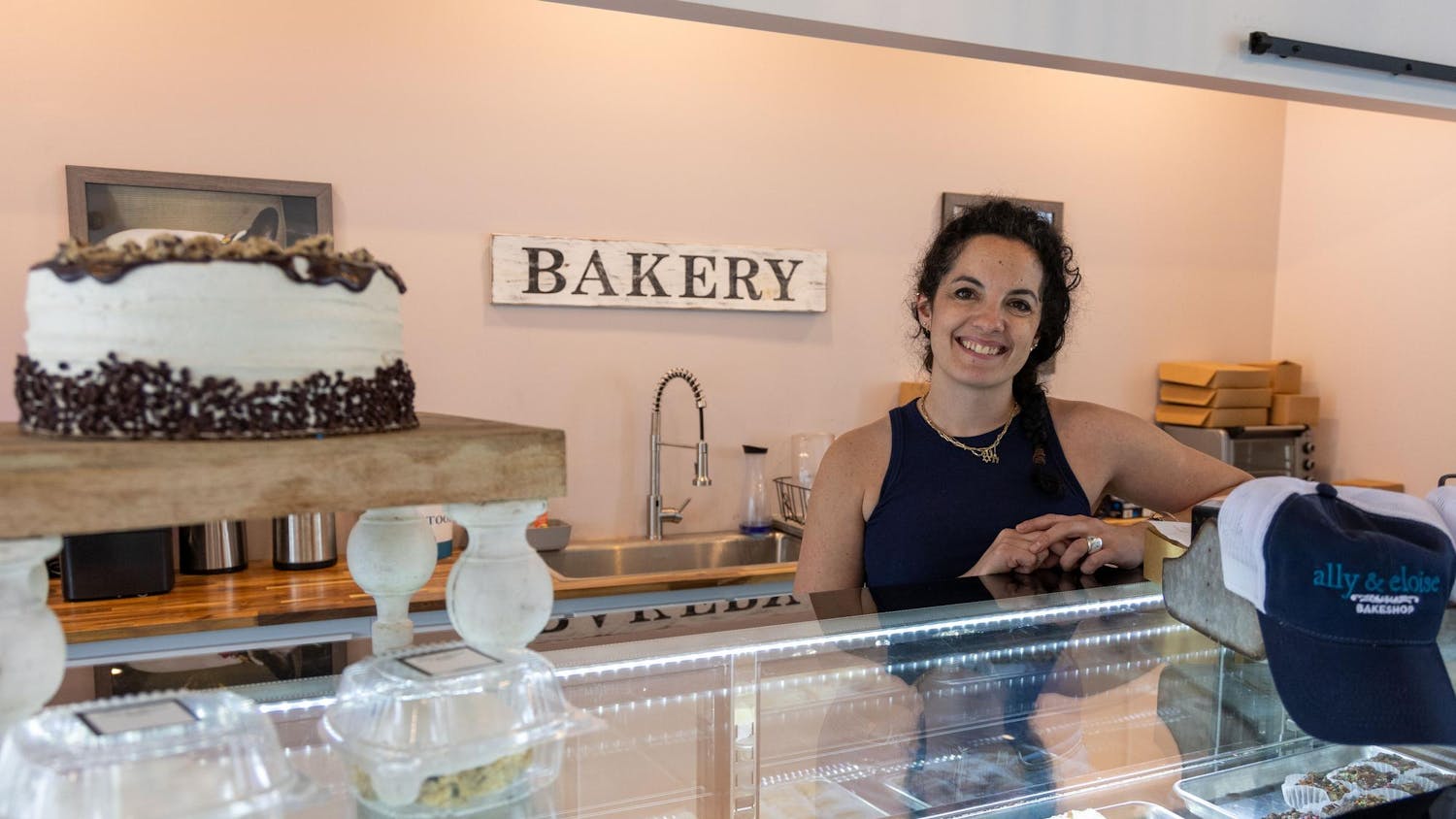 The owner of Ally &amp; Eloise, Aleka Selig, poses for a photo inside the bakery. Selig opened the bakery in April of 2012.