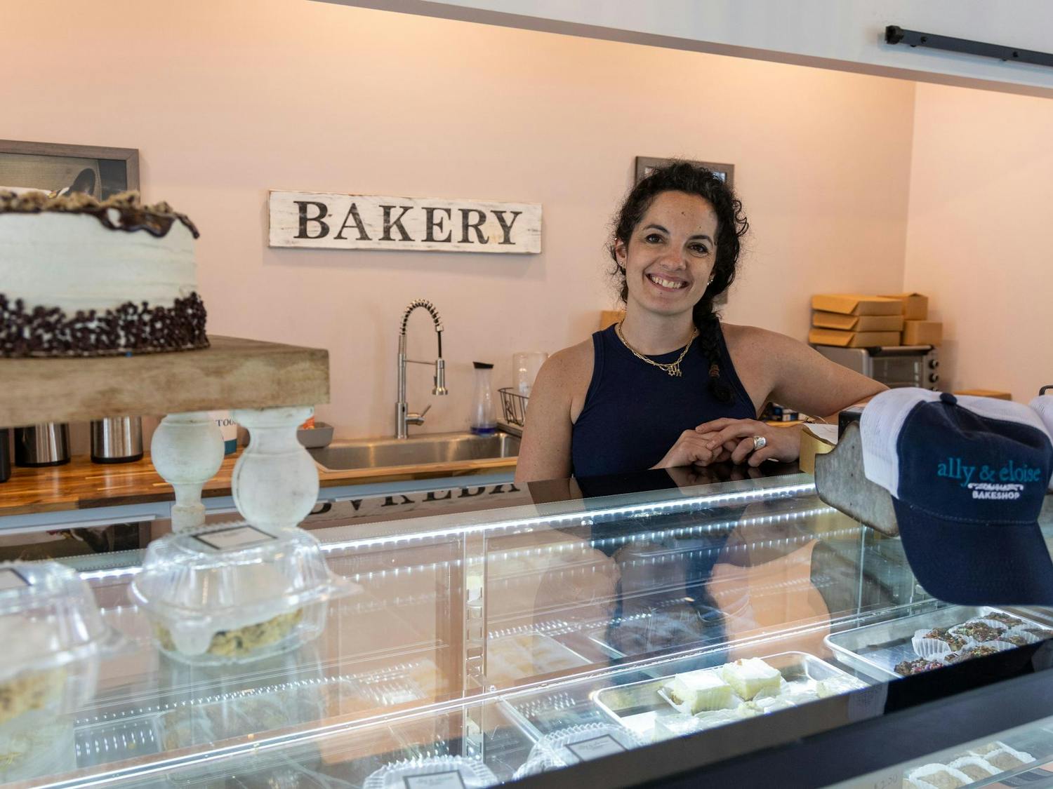 The owner of Ally &amp; Eloise, Aleka Selig, poses for a photo inside the bakery. Selig opened the bakery in April of 2012.