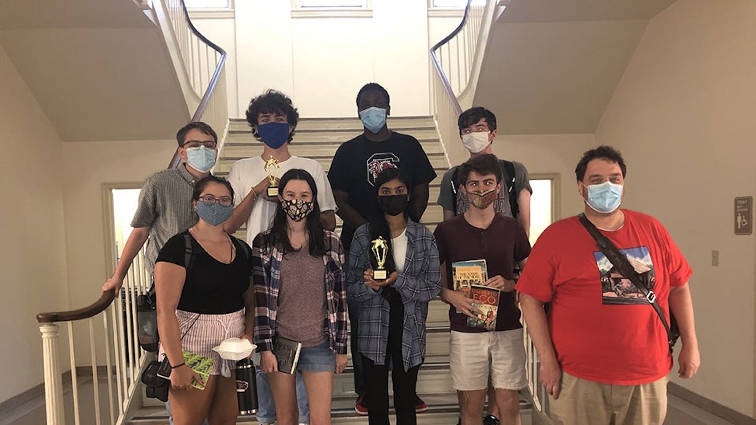 Members of the University of South Carolina Academic Team with their first place trophy after winning the first in-person competition in two years in Durham, North Carolina, on Oct. 16. 