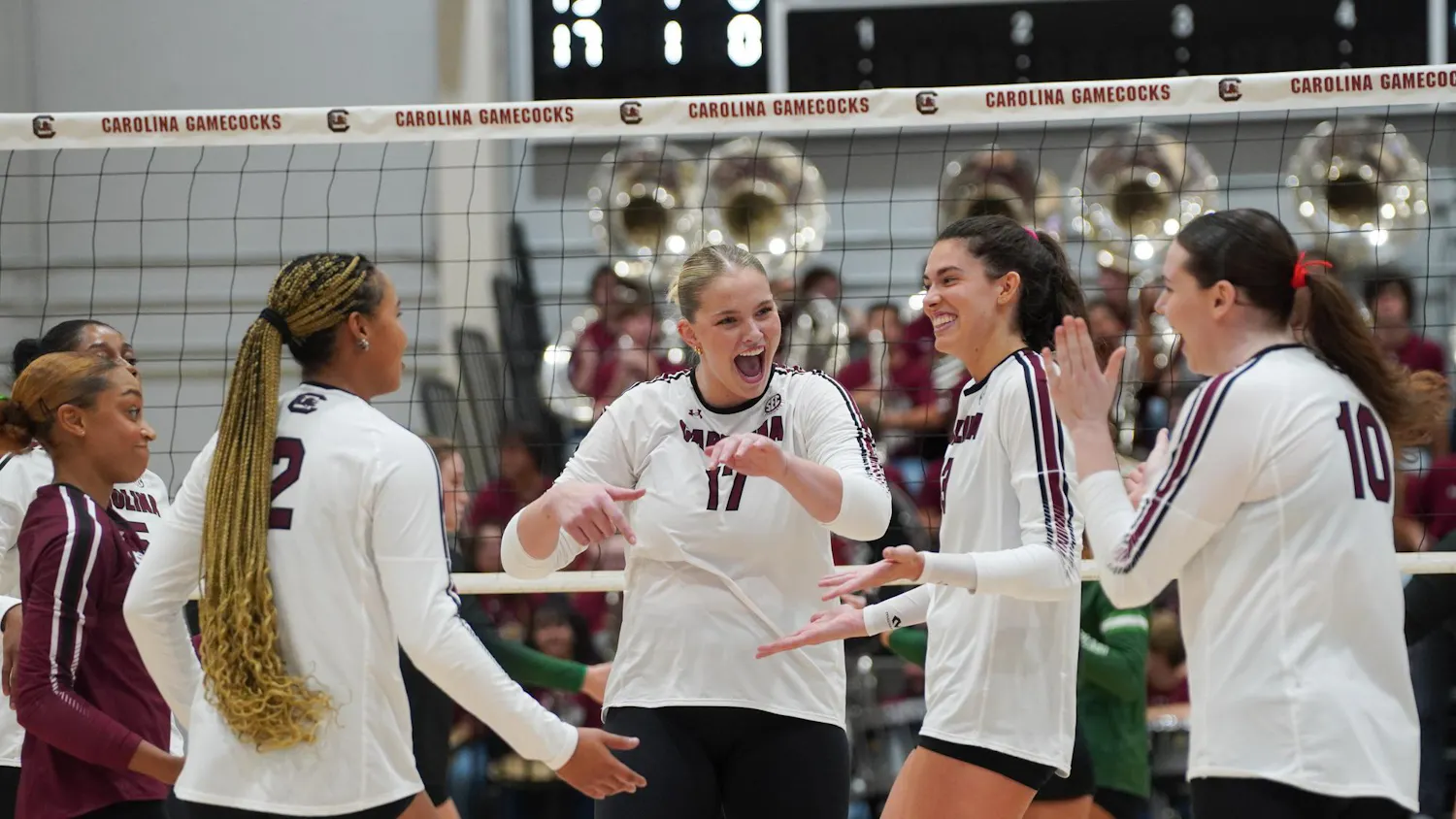 USC teammates celebrate after a close final set against USC Upstate at Carolina Volleyball Center on Sept. 19, 2025. The Gamecocks won the final set 25-23.