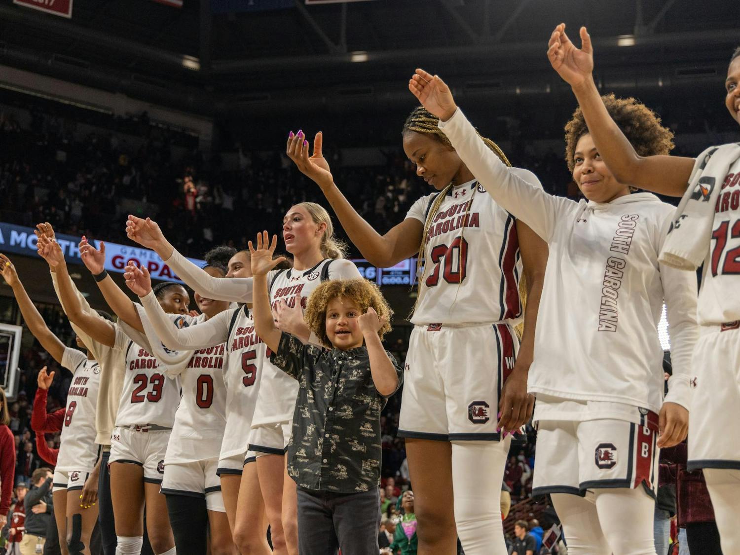 South Carolina women's basketball players hold up a toast during the playing of the school's alma mater at Colonial Life Arena. The No. 2 Gamecocks defeated the No. 5 LSU Tigers on Jan. 24, 2025, ruining the Tigers' so-far perfect season.