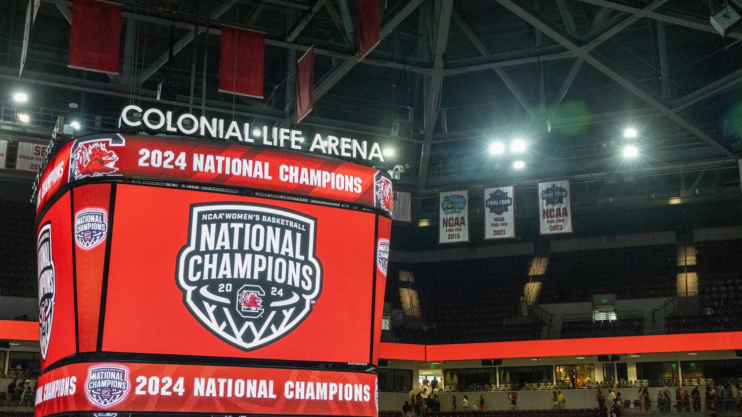 The video board inside Colonial Life Arena displays a graphic honoring USC's women's basketball team as the 2024 NCAA Women's Basketball National Champions following a welcome home event on April 8, 2024. The Gamecocks ended the season 38-0 following an 87-75 victory over the Iowa Hawkeyes.