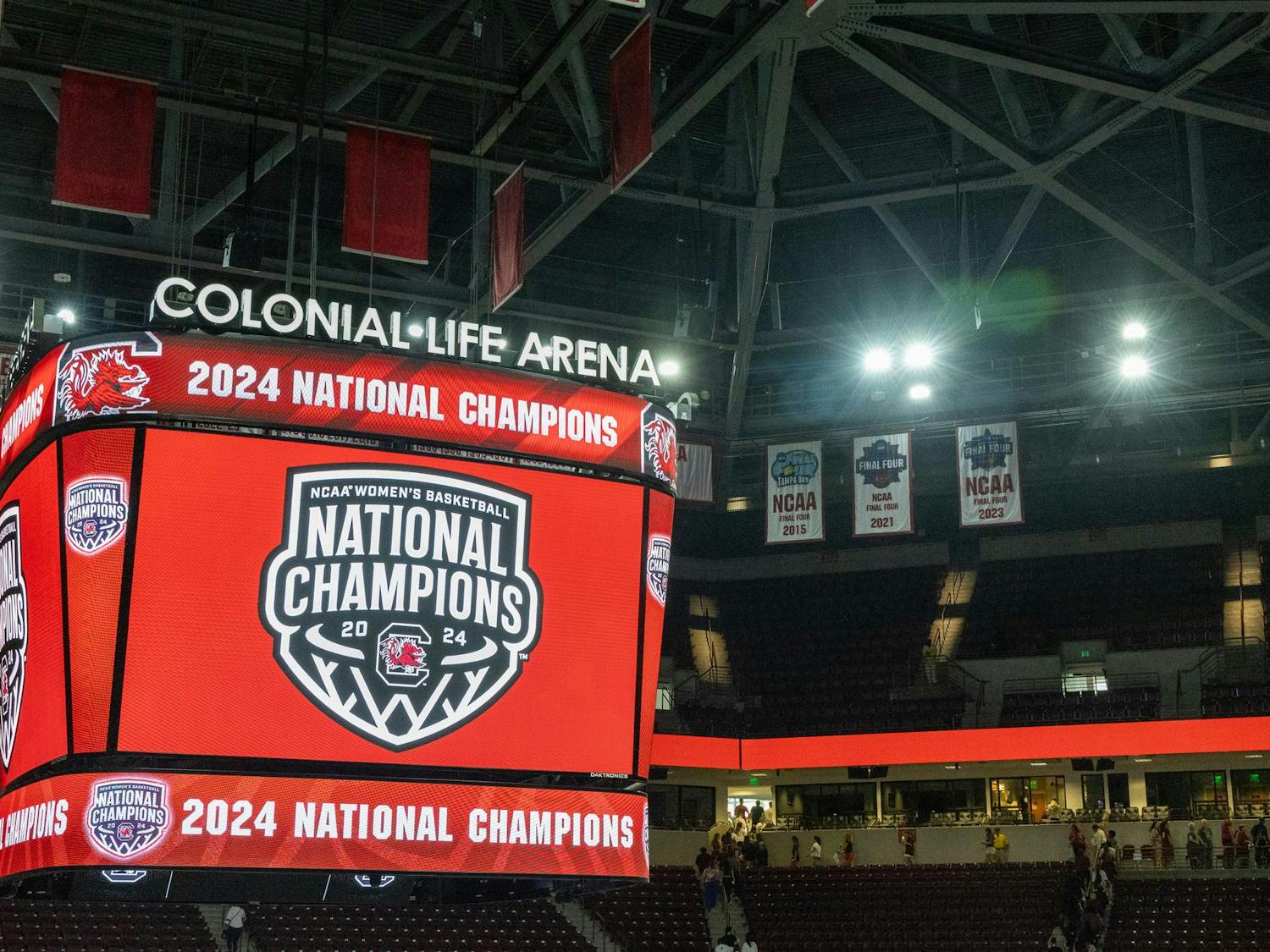 The video board inside Colonial Life Arena displays a graphic honoring USC's women's basketball team as the 2024 NCAA Women's Basketball National Champions following a welcome home event on April 8, 2024. The Gamecocks ended the season 38-0 following an 87-75 victory over the Iowa Hawkeyes.