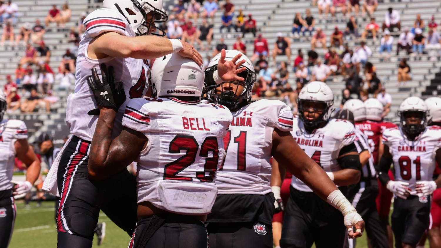  A player jumps up towards sophomore tight end Jaheim Bell during the 2021 Spring Game. 