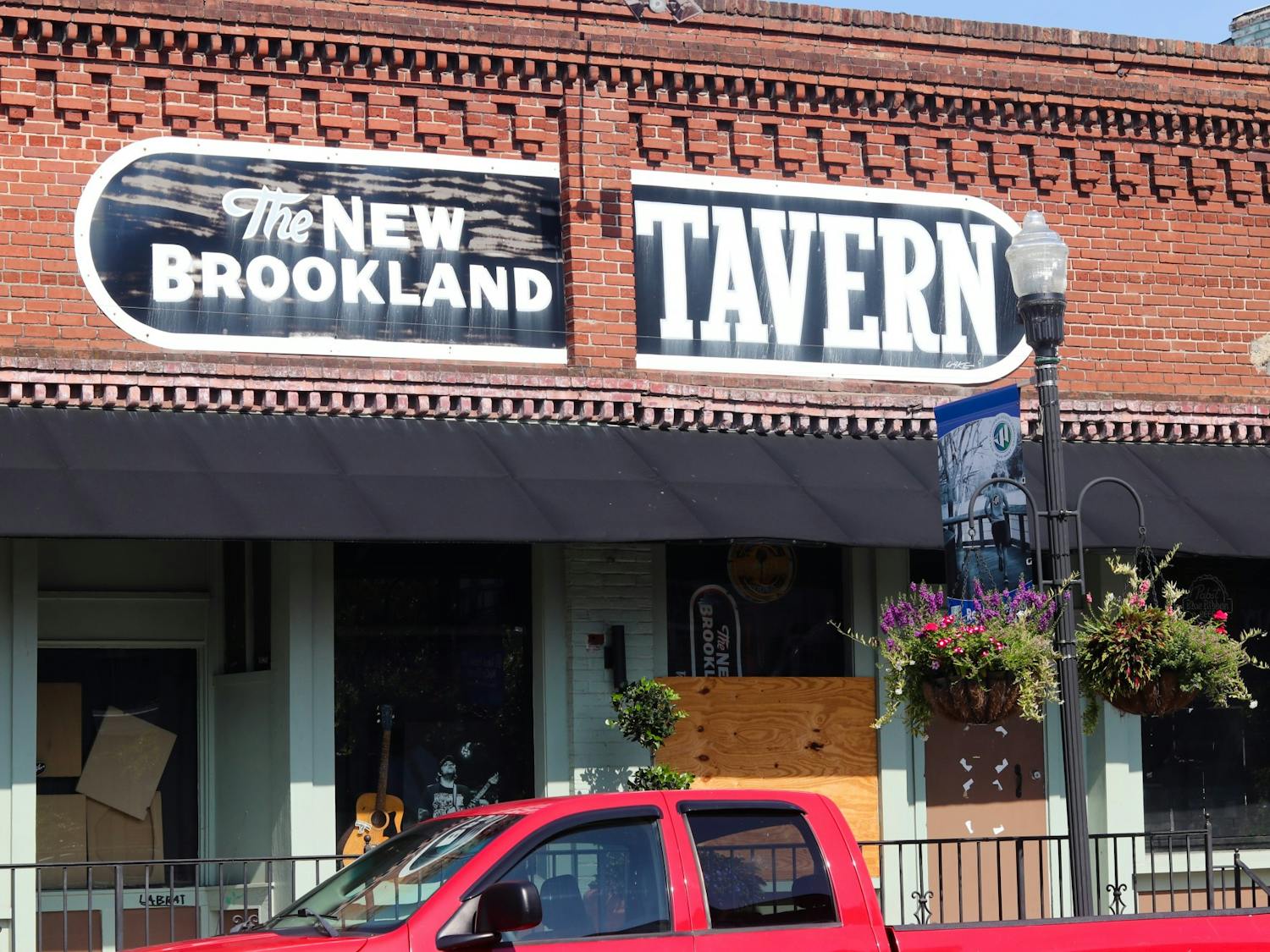 A picture of a sign that says 'The New Brookland Tavern' on July 25, 2022. The sign hangs above the entrance of the smallest and one of the oldest concert venues in Columbia.&nbsp;