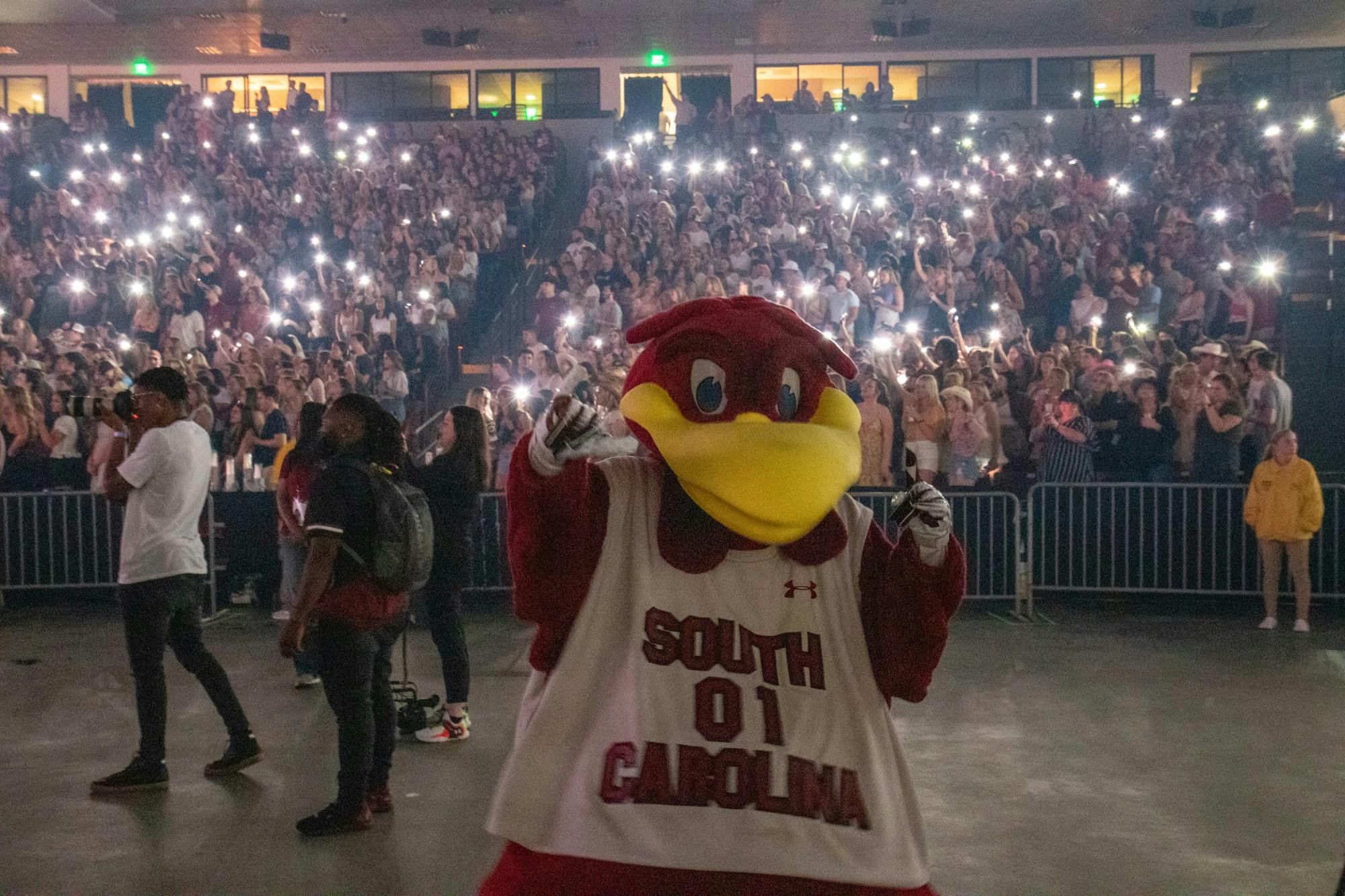 South Carolina students wave cell phone lights in the air to the beat of Darius Rucker’s hit “History in the Making” during a concert at Colonia Life Arena on April 24, 2022. The concert was held as a celebration for the women's basketball team.