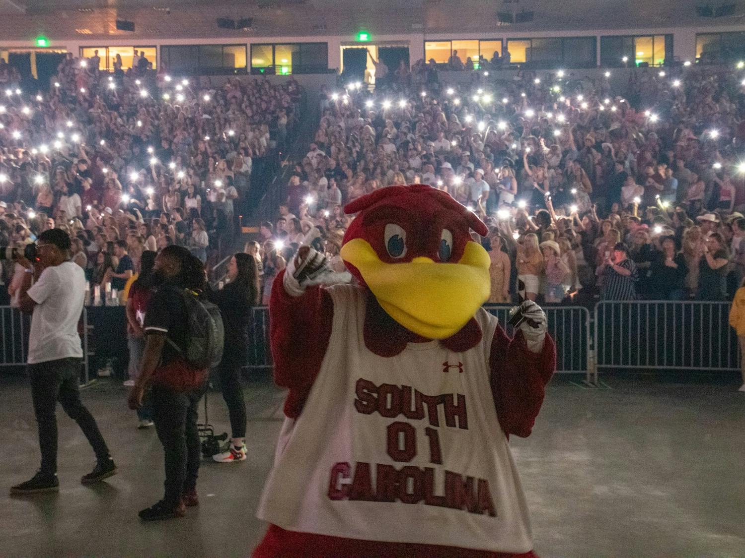 South Carolina students wave cell phone lights in the air to the beat of Darius Rucker’s hit “History in the Making” during a concert at Colonia Life Arena on April 24, 2022. The concert was held as a celebration for the women's basketball team.