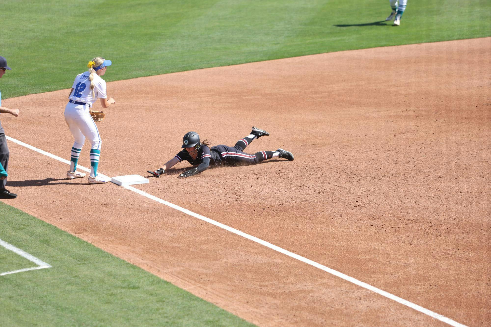 A South Carolina player slides safely into third base against Florida on April 11, 2026, at Beckham Field. The Gamecocks lost 15-2 to the Gators.