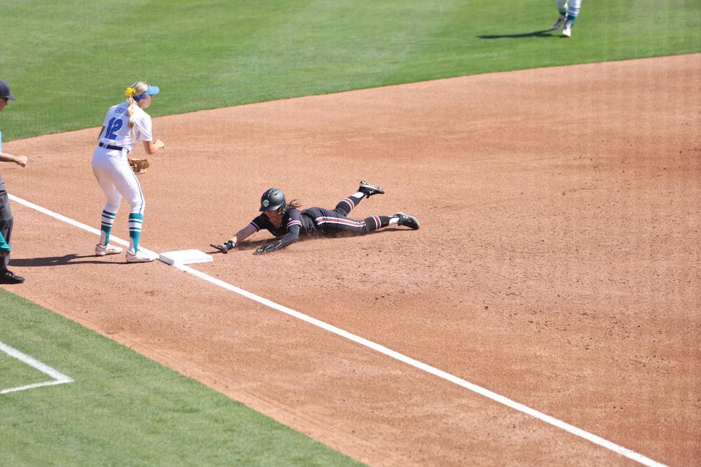 <p>A South Carolina player slides safely into third base against Florida on April 11, 2026, at Beckham Field. The Gamecocks lost 15-2 to the Gators.</p>