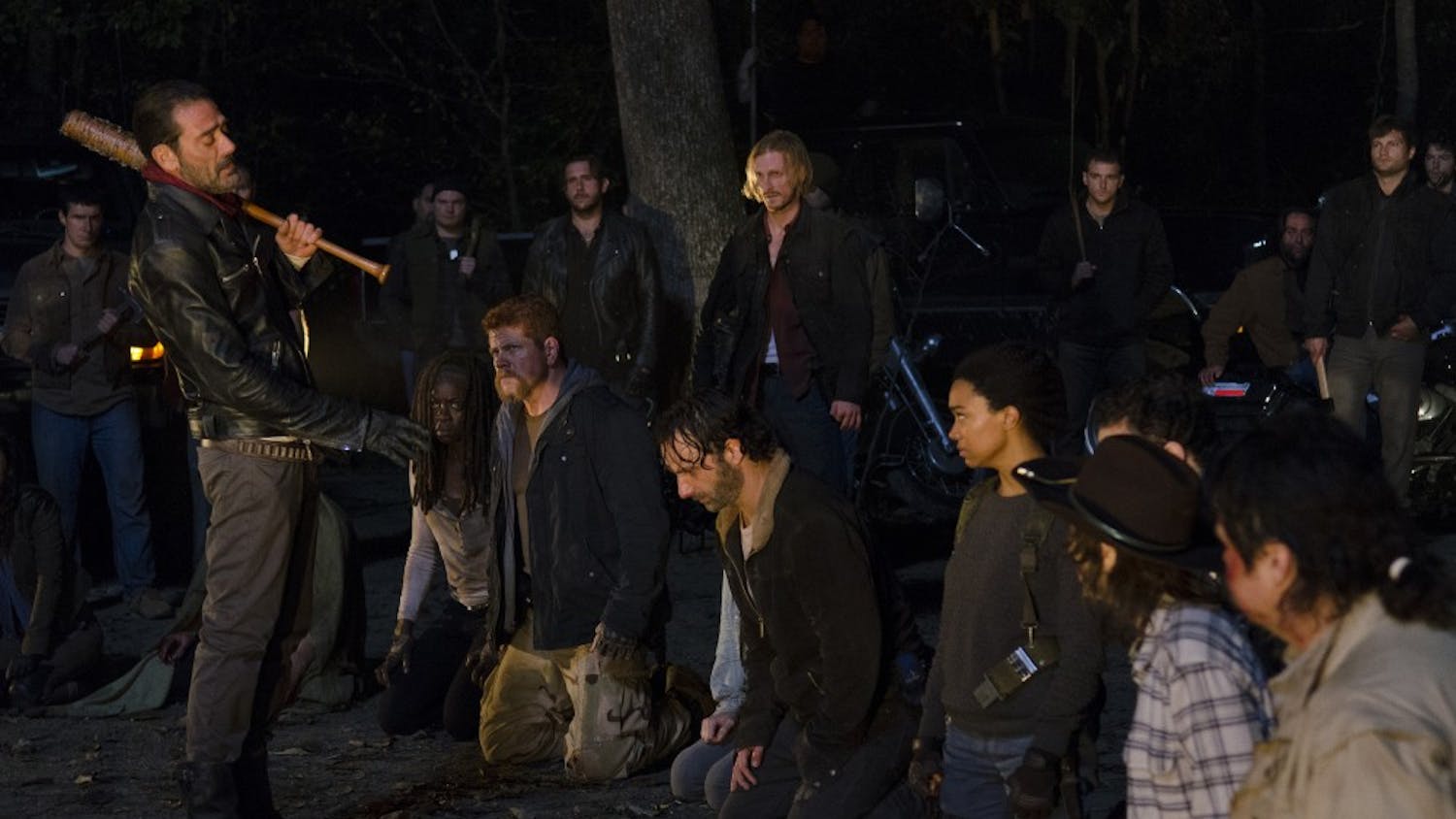 Negan (Jeffrey Dean Morgan) stands before Michonne (Danai Gurira), Abraham (Michael Cudlitz), Maggie (Lauren Cohan), Rick (Andrew Lincoln) and Sasha (Sonequa Martin-Green), Carl (Chandler Riggs) and Eugene (Josh McDermitt) during the final cliffhanger scene of season six of AMC's "The Walking Dead." (Gene Page/AMC)