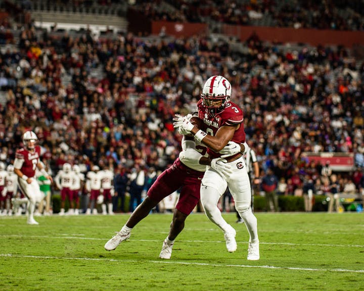 FILE—Junior wide receiver Antwane Wells Jr. attempts to shake off a tackle after catching a pass during the matchup between South Carolina and South Carolina State on Sept. 29, 2022. The Gamecocks beat the Bulldogs 50-10.