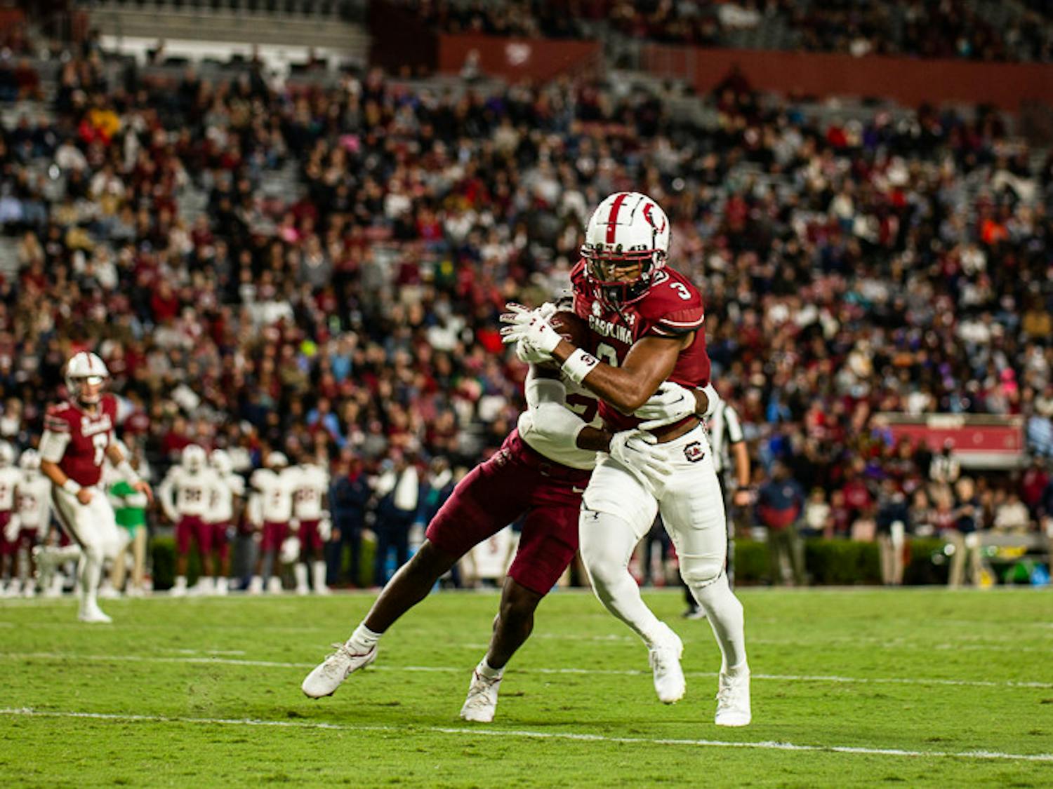 FILE—Junior wide receiver Antwane Wells Jr. attempts to shake off a tackle after catching a pass during the matchup between South Carolina and South Carolina State on Sept. 29, 2022. The Gamecocks beat the Bulldogs 50-10.