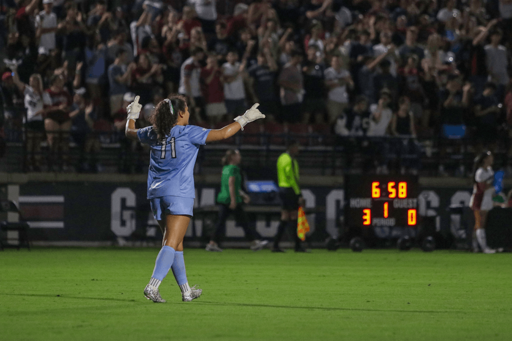 <p>Senior goalkeeper Christina Tsaousis celebrates the Gamecocks' third goal in Eugene E. Stone III Stadium on Sept. 18, 2025. Tsaousis played the first half of the game and had one save.</p>