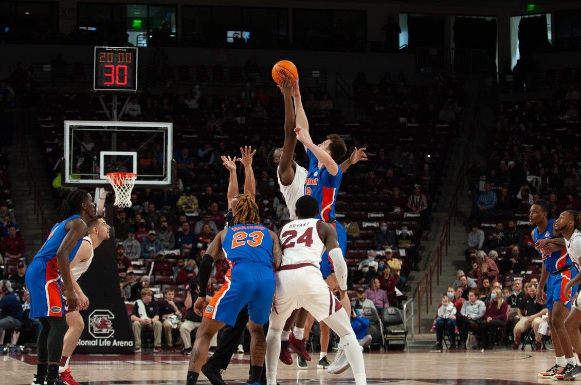 Junior forward Wildens Leveque wins the tip off for Carolina at the start of the game against the Florida Gators on Jan. 15, 2022 in Columbia, SC. The Gamecocks lost to Florida 71-63.