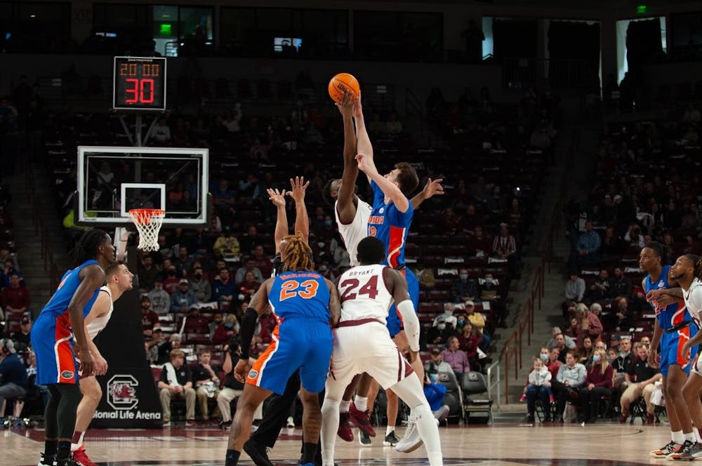 <p>Junior forward Wildens Leveque wins the tip off for Carolina at the start of the game against the Florida Gators on Jan. 15, 2022 in Columbia, SC. The Gamecocks lost to Florida 71-63.</p>