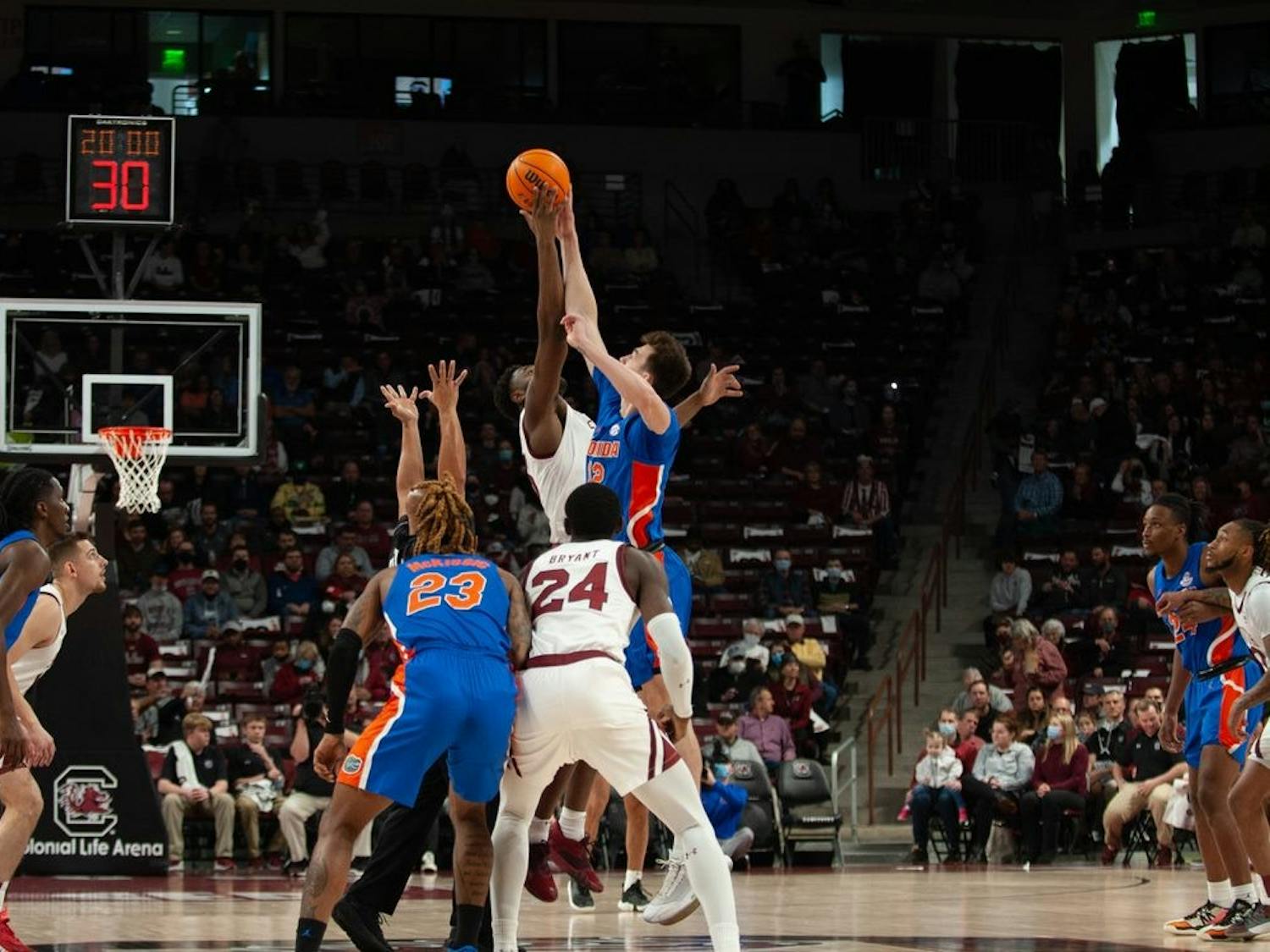 Junior forward Wildens Leveque wins the tip off for Carolina at the start of the game against the Florida Gators on Jan. 15, 2022 in Columbia, SC. The Gamecocks lost to Florida 71-63.