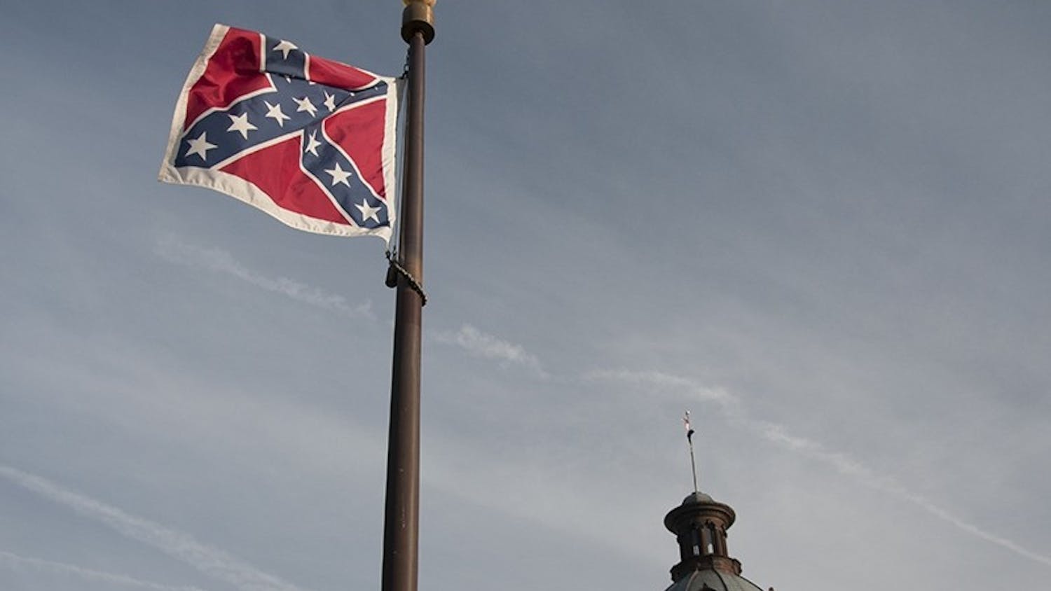 In the spring of 2000, legislation was passed to remove the Confederate battle flag from the State House dome.