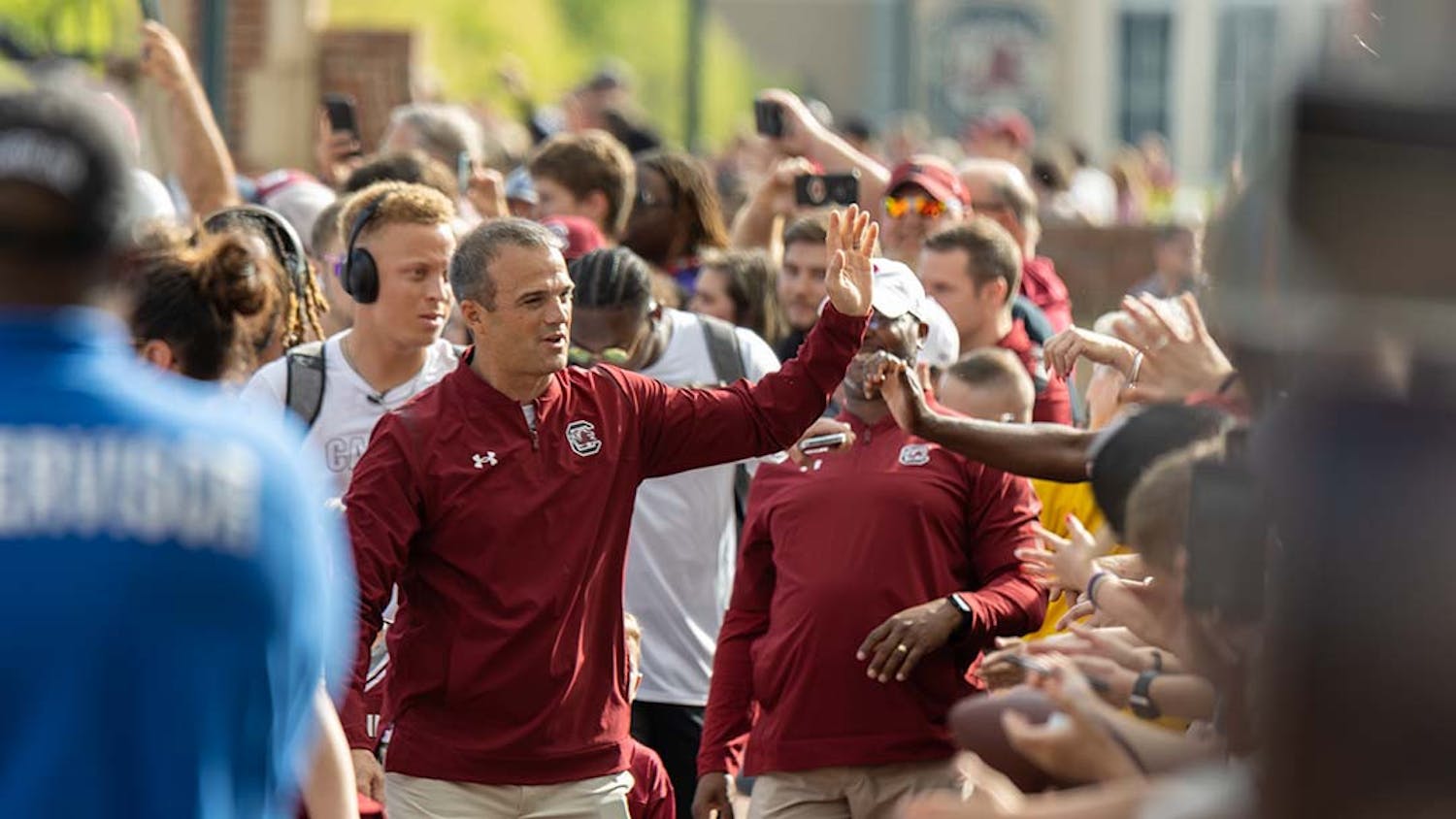 FILE — Head football coach Shane Beamer greets fans during the Gamecock Walk prior to the Garnet and Black Spring game on April 16, 2022.