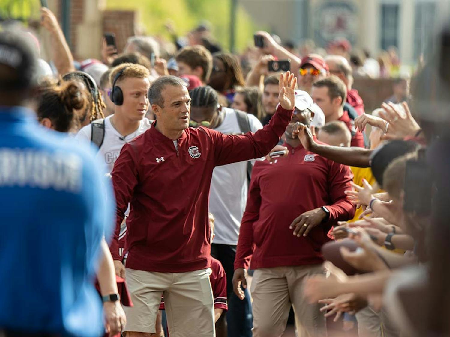 FILE — Head football coach Shane Beamer greets fans during the Gamecock Walk prior to the Garnet and Black Spring game on April 16, 2022.