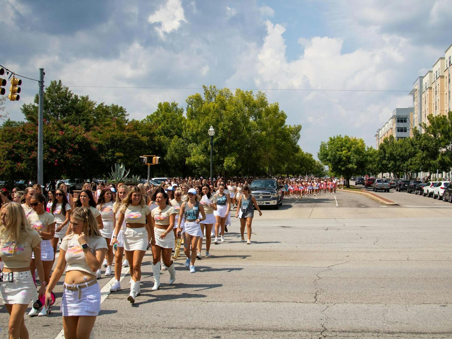 University of South Carolina sorority members walk from Colonial Life Arena to Greek Village during Bid Day festivities. Large groups of girls crossed Blossom Street after the ceremony. 