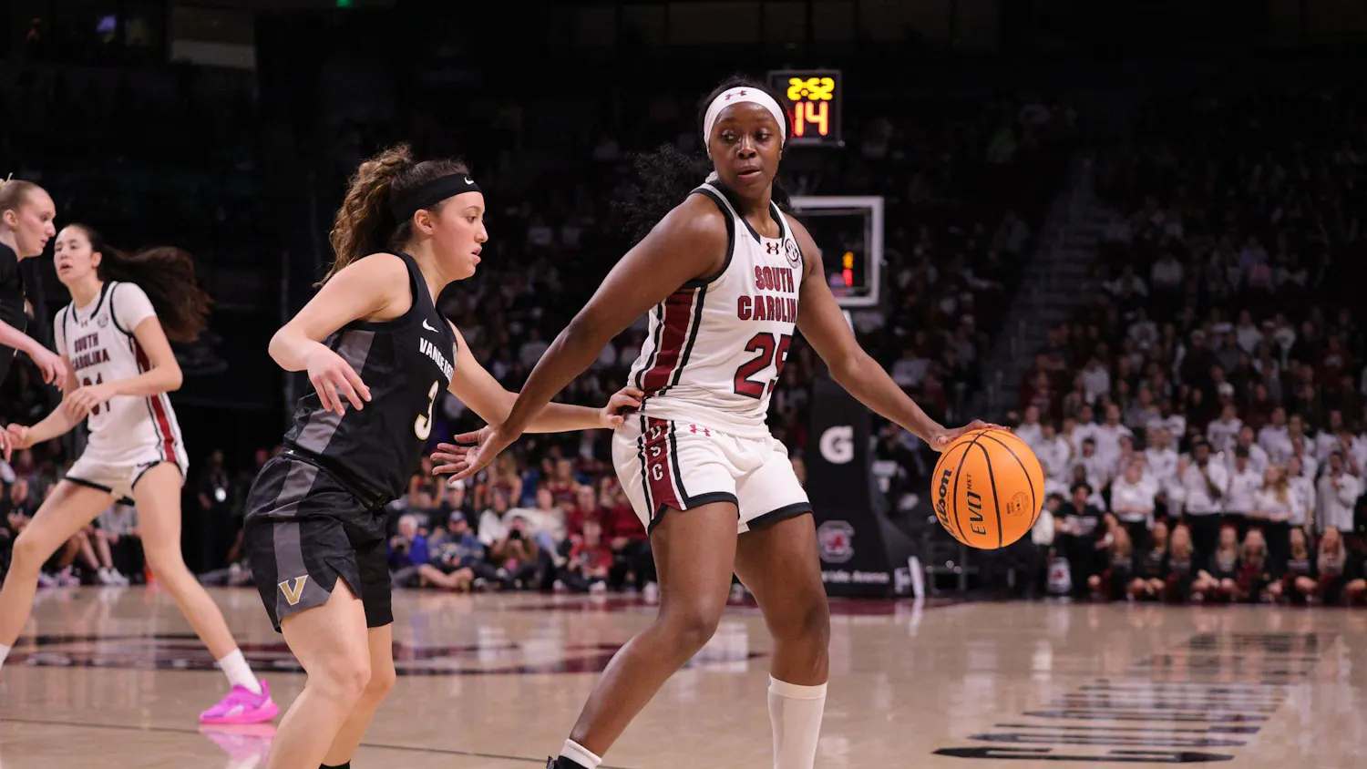 Senior guard Raven Johnson dribbles against a Vanderbilt defender during the Gamecocks’ matchup at Colonial Life Arena on Jan. 25. She looks for space to set up the next play as her teammates move around her.