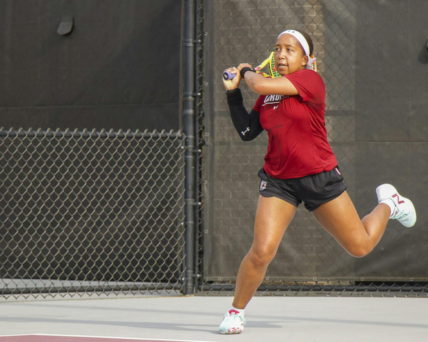 FILE—Senior Ayana Akli follows through with a hit on March 1, 2023, at Carolina Tennis Center. Akli was All-SEC First Team in 2022. &nbsp;