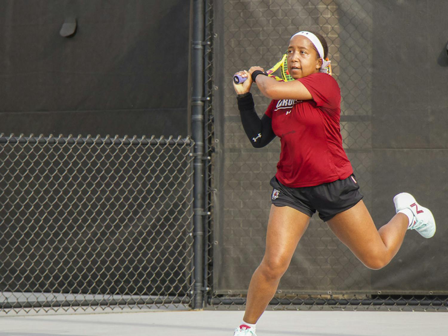 FILE—Senior Ayana Akli follows through with a hit on March 1, 2023, at Carolina Tennis Center. Akli was All-SEC First Team in 2022. &nbsp;