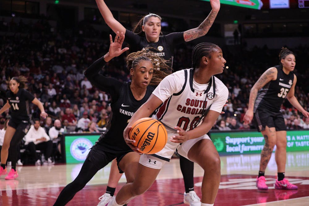 <p>FILE — Senior guard Ta'Niya Latson holds the ball during the Gamecocks’ matchup with Vanderbilt at Colonial Life Arena on Jan. 25. She looks for room to move while defenders close in around her.</p>