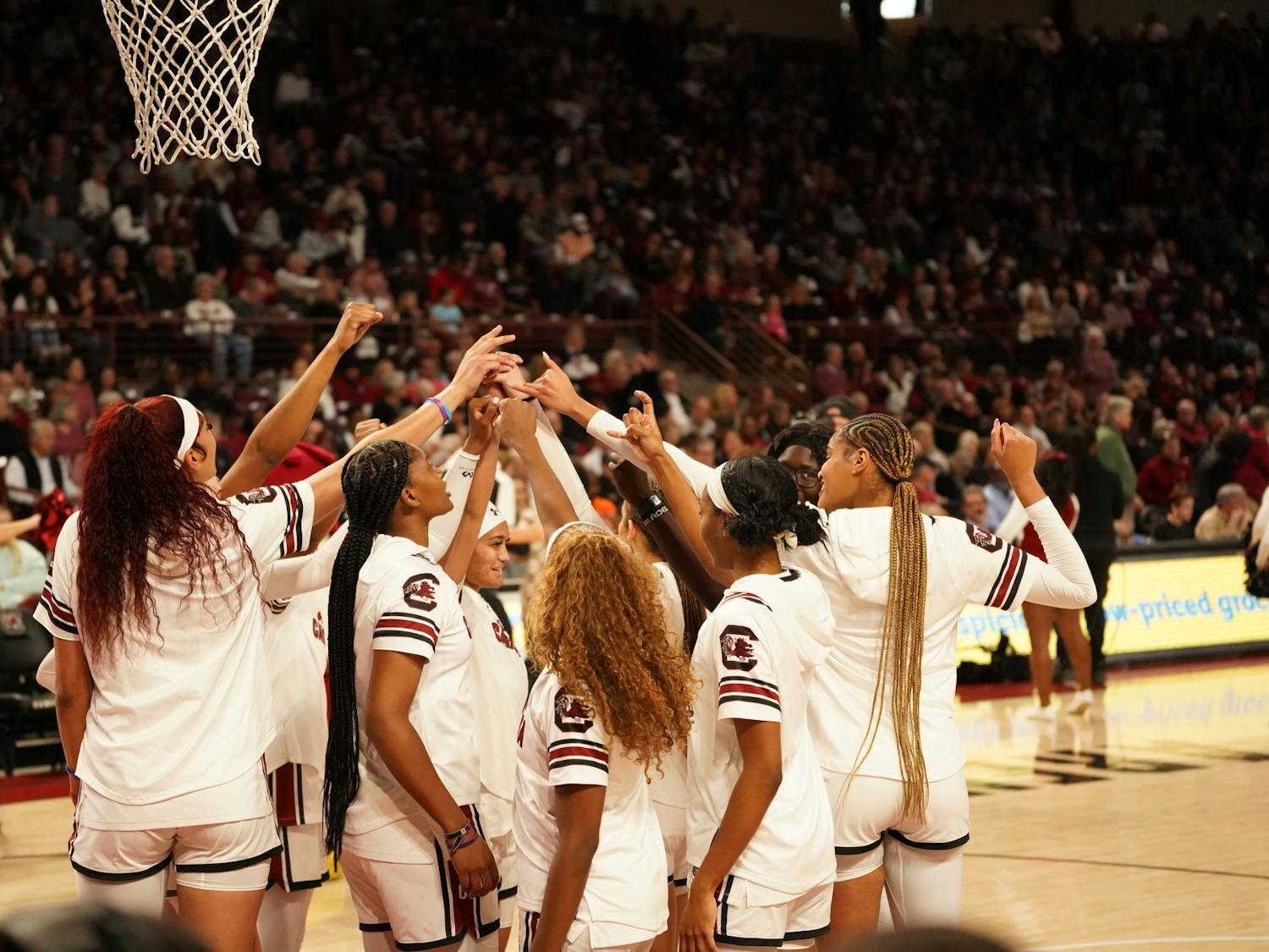 FILE - The South Carolina women's basketball team huddles under the hoop before tip-off. The Gamecocks improved to 25-0 as it defeated the Georgia Bulldogs on Feb. 18, 2024. The team is undefeated for the 2023-24 season so far and is looking for a run in the NCAA Tournament. 