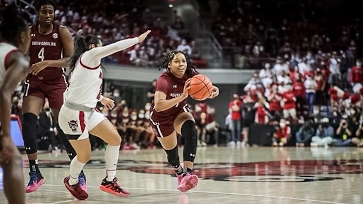 Junior guard Zia Cooke taking the ball down the court. Cooke scored 17 points against NC State on Nov. 9, 2021.