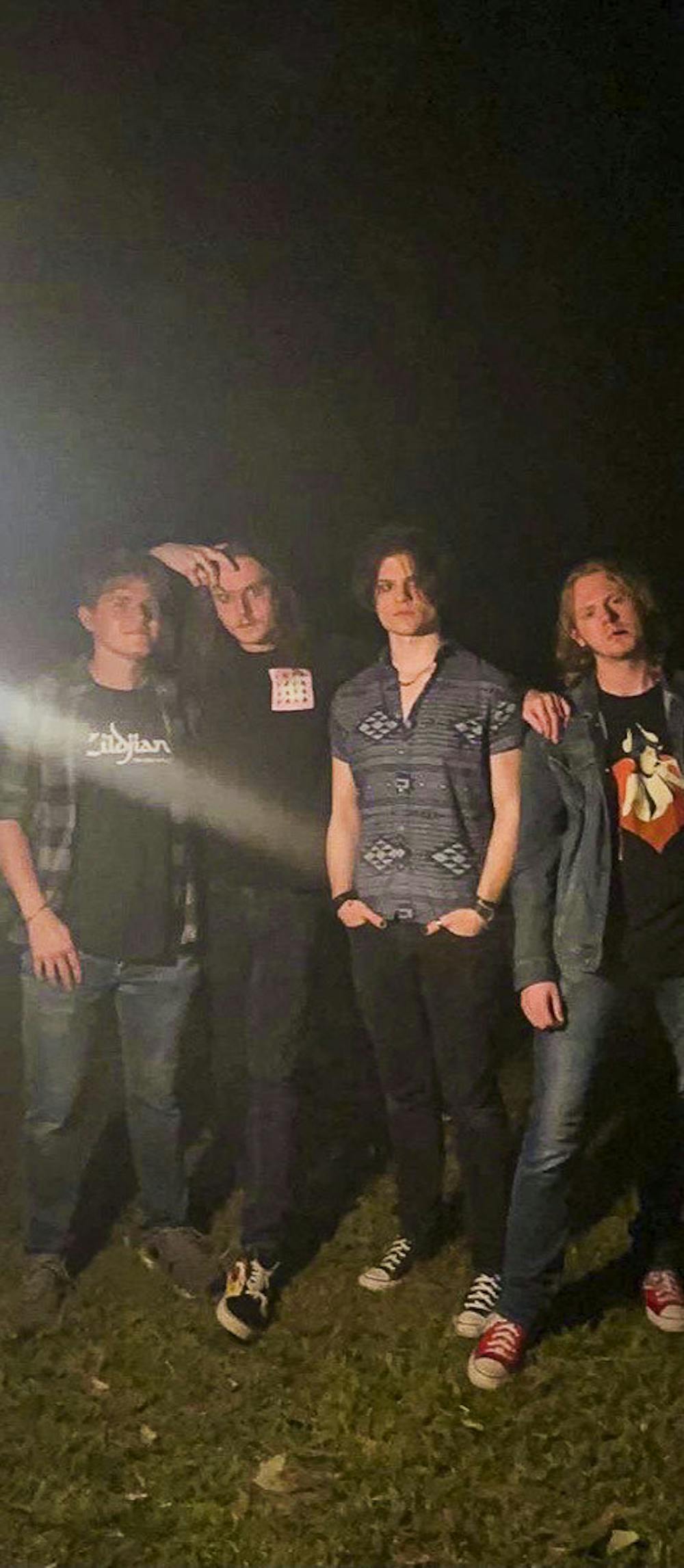 <p>Bleeding Trees members, (from left to right) drummer Blake Walker, guitarist Gavin Seboe, guitarist and vocalist Jeremy Wheeler and bassist and backup vocalist Boodrix Seboe, pose together after a house show in Sumter, SC on Jan. 1, 2023. The Columbia-based alternative grunge emo band said it likes to bring theatrics and emotion in their songs and performances.&nbsp;</p>
