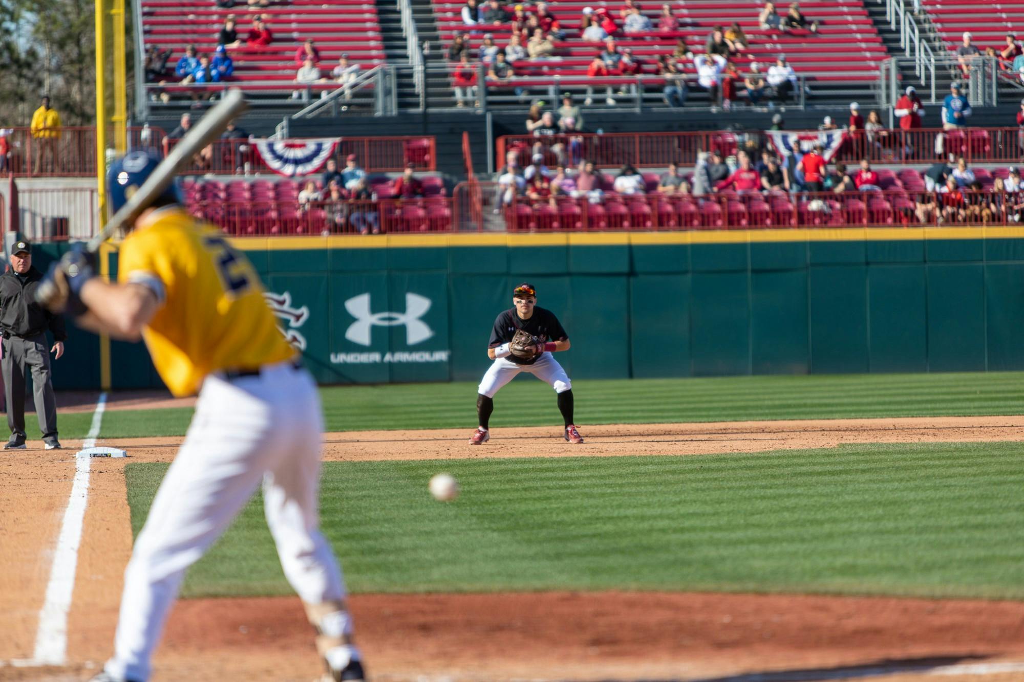 UNCG infielder Zack Budzik stands over home plate. Carolina defeated UNCG in the last game of their series 8-7.&nbsp;