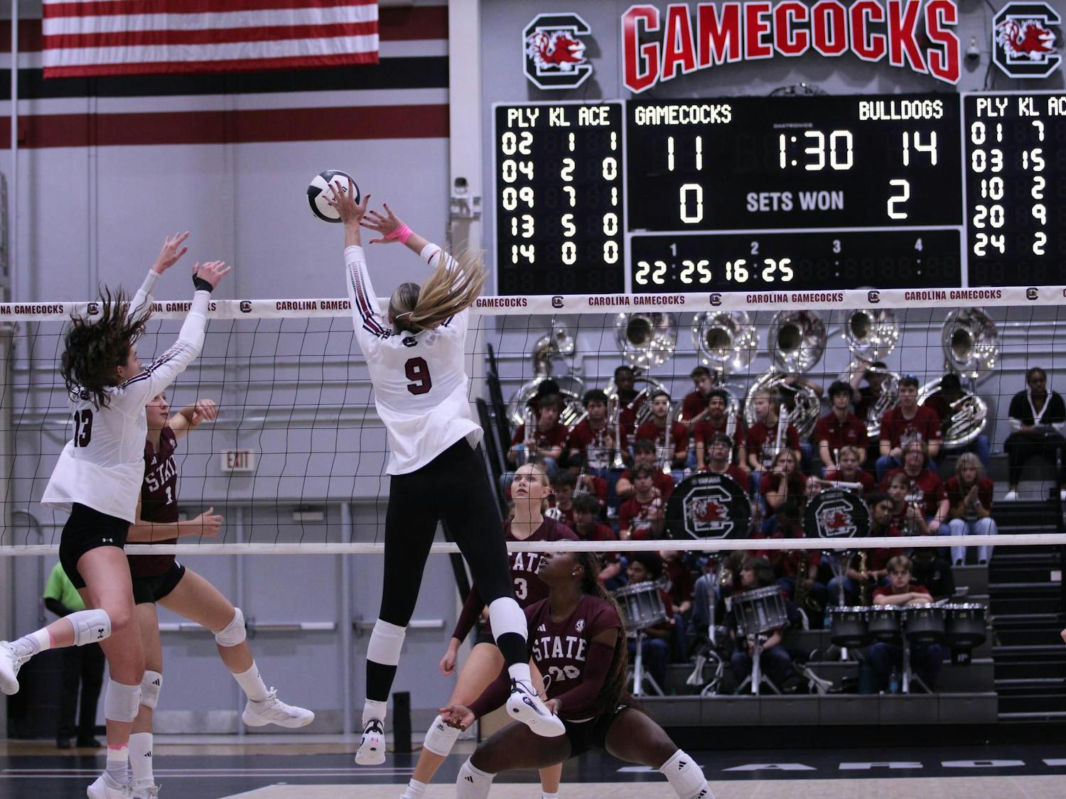 South Carolina junior middle Ava Leahy and her teammate, senior outside hitter Alayna Johnson, block the Mississippi State volleyball team in their match on Oct. 17, 2025. The Gamecocks lost in their third set against the Bulldogs, with a final score of 3-0.