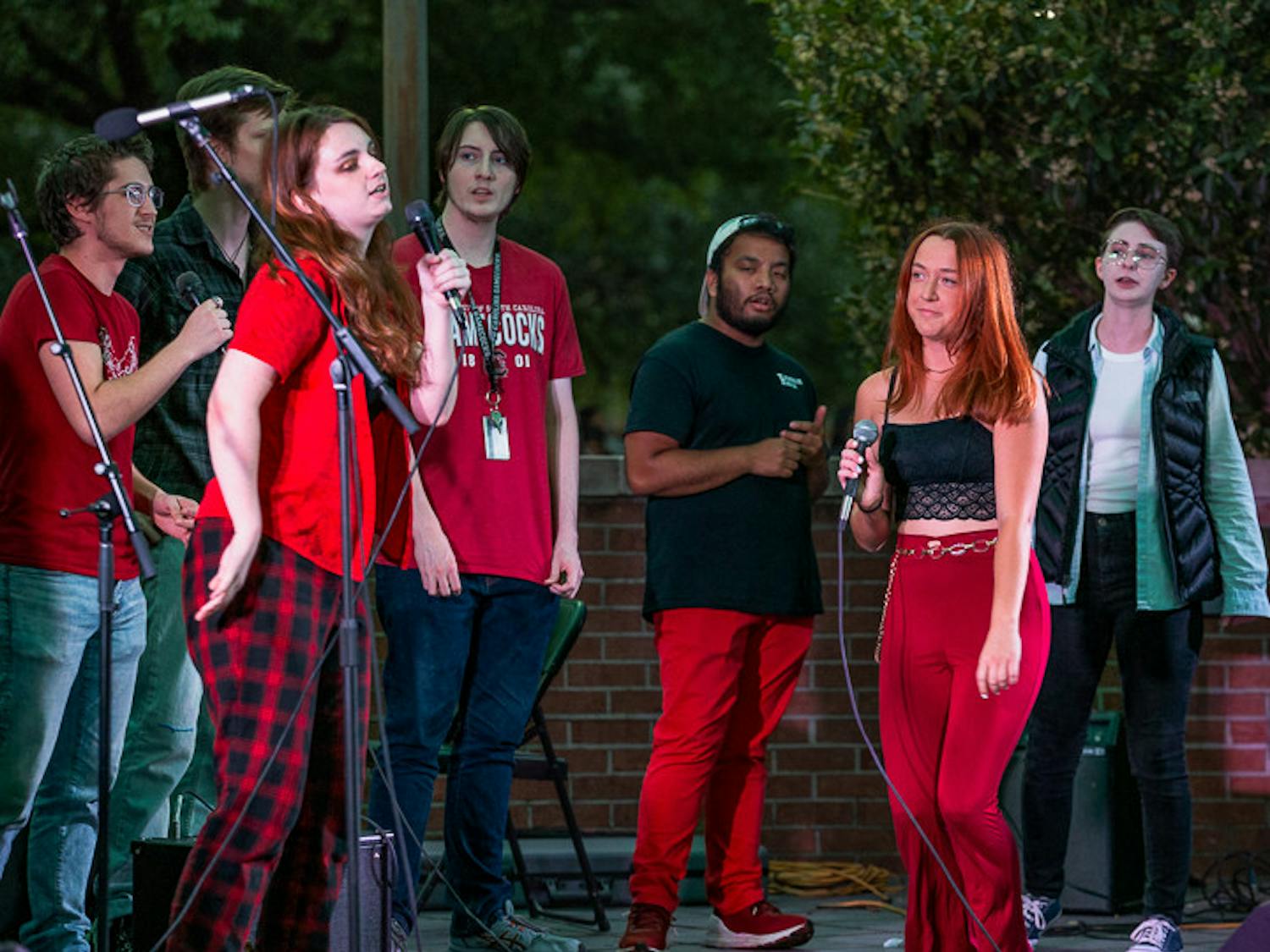 Third-year media arts student Alex Fossum (left) and third-year psychology student Erin McDonough (right) sing a duet during The Resonance's opening act on Oct. 5, 2022. The bands competed to be able to perform at the UofSC Homecoming Block Party on Oct. 28, 2022.