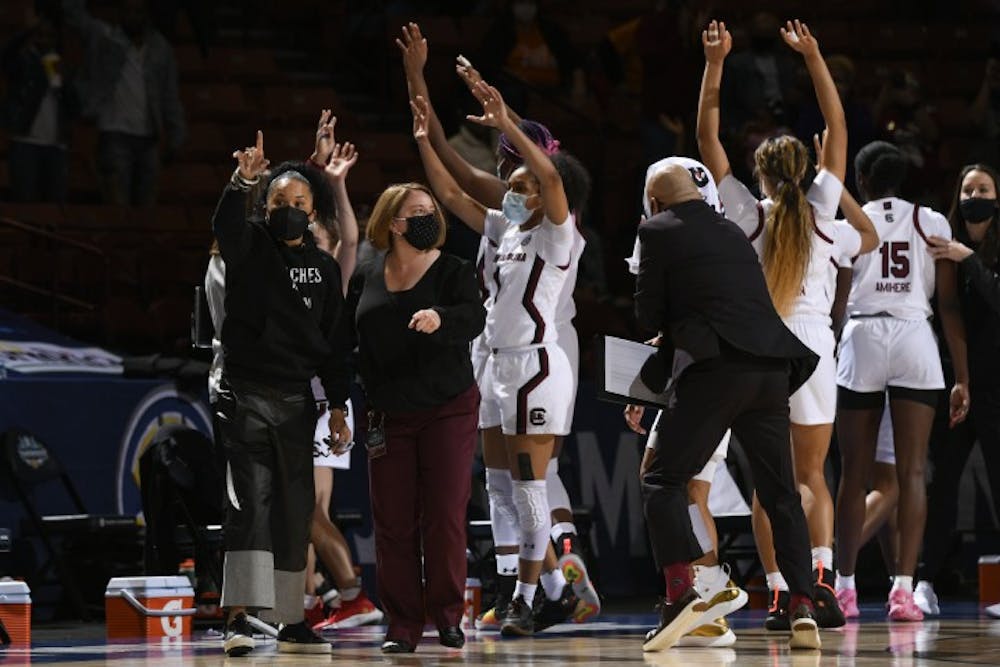 The South Carolina women's basketball team celebrates after a win in the 2021 NCAA tournament.