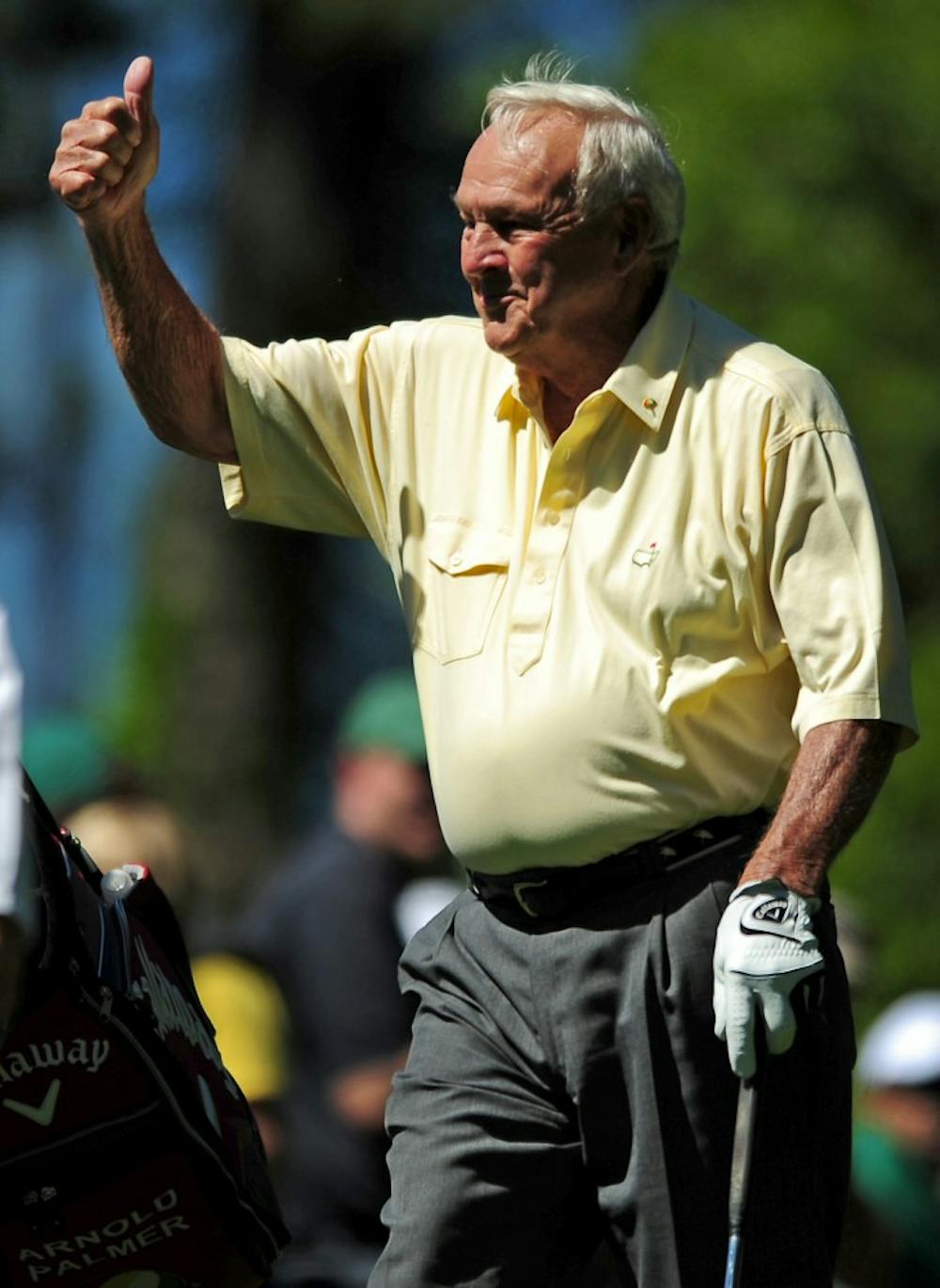 Arnold Palmer gives the thumbs up to the fans as they applaud his pairing that included Gary Player and Jack Nicklaus during the Par 3 Contest prior to The Masters at Augusta National Golf Club, on Wednesday, April 6, 2011, in Augusta, Georgia. (Jeff Siner/Charlotte Observer/MCT)