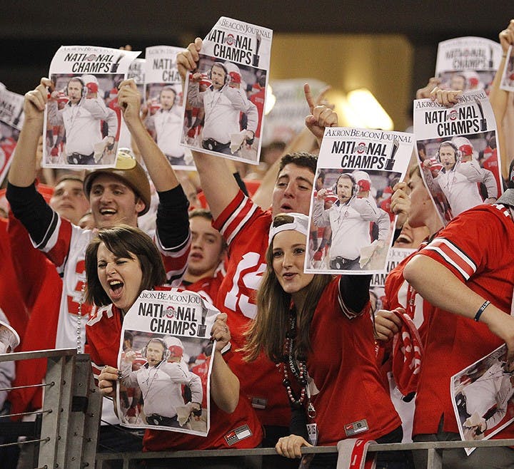 Ohio State fans celebrate after their team&apos;s win against Oregon in the CFP National Championship on Monday, Jan. 12, 2015, at AT&amp;T Stadium in Arlington, Texas. (Paul Moseley/Fort Worth Star-Telegram/TNS)