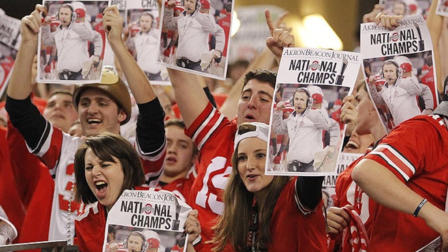 Ohio State fans celebrate after their team's win against Oregon in the CFP National Championship on Monday, Jan. 12, 2015, at AT&T Stadium in Arlington, Texas. (Paul Moseley/Fort Worth Star-Telegram/TNS)