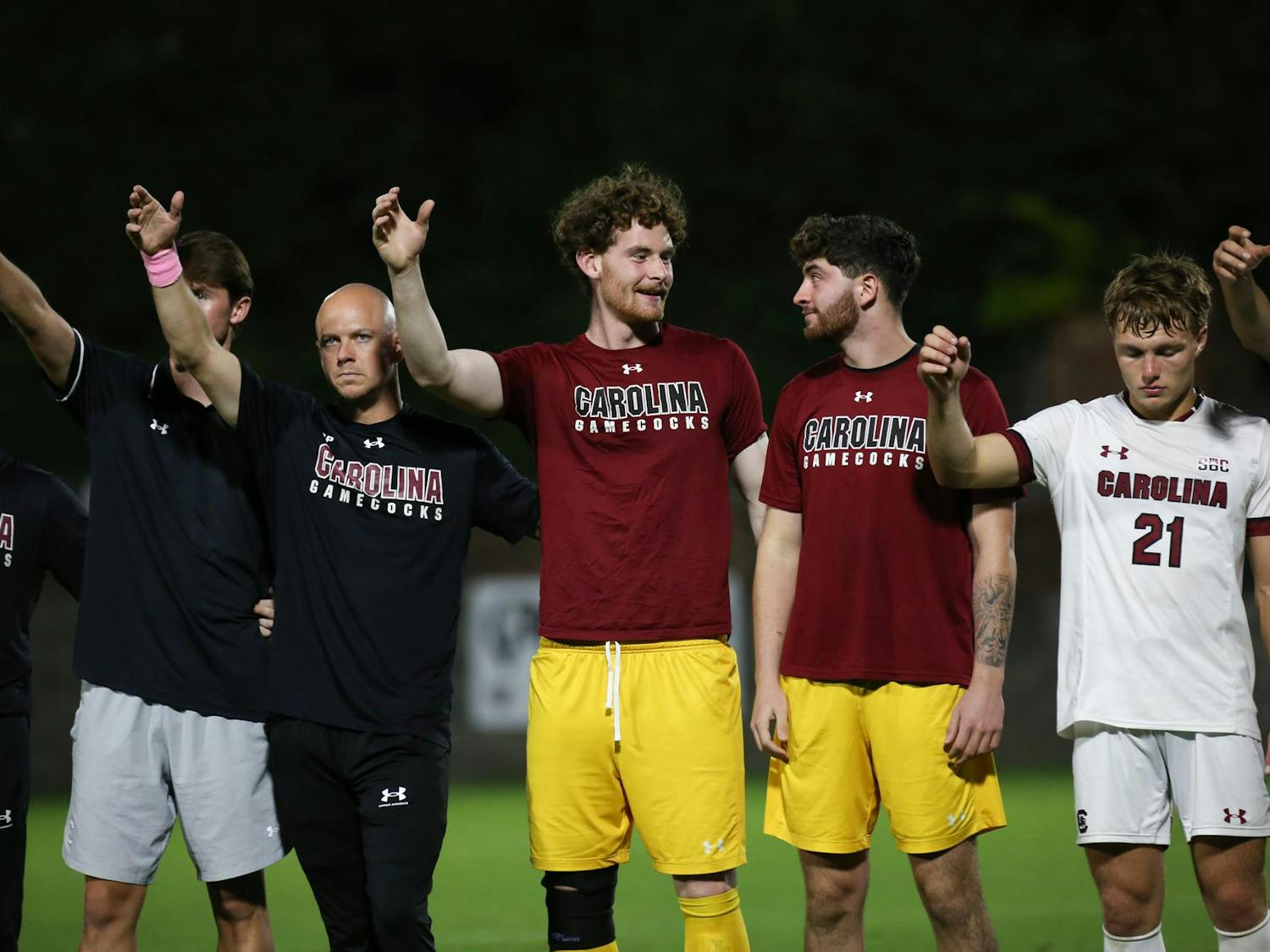 Redshirt senior goalkeeper Brant Zulauf and redshirt freshman goalkeeper Matt Bender sing the alma mater with their teammates after the team's game against Jacksonville University on Oct. 3, 2023. The Gamecocks defeated the Dolphins 1-0. 