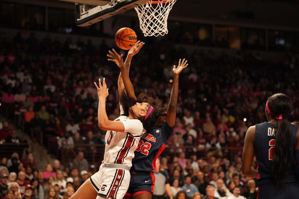 <p>FILE - Senior center Kamilla Cardoso attempts a lay-up with a defender on her. Cardoso led the team with 17 points and four blocks when the Gamecocks beat the Rebels 85-56 on Feb. 4, 2024 at Colonial Life Arena.</p>