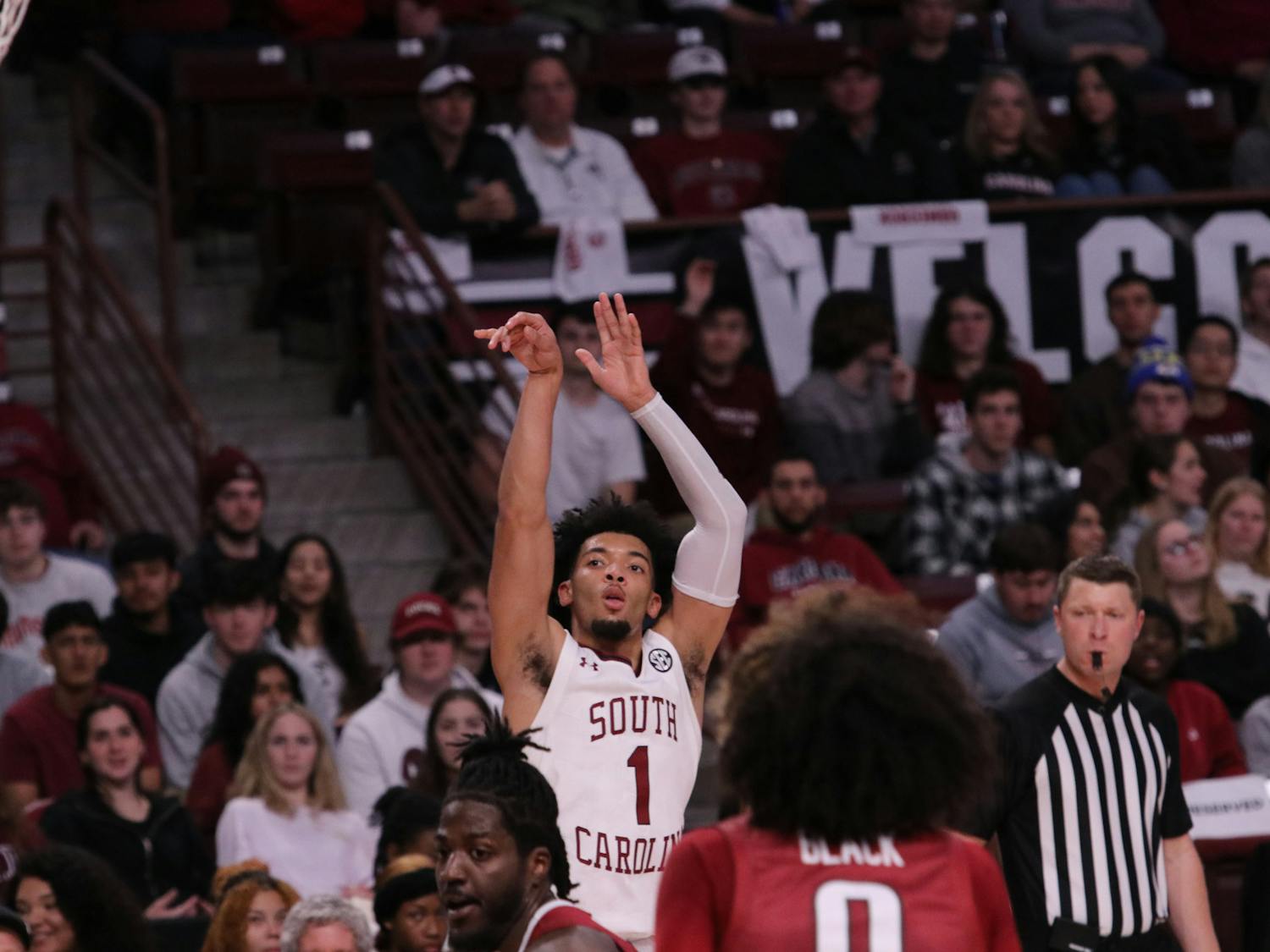 FILE—Sophomore guard Jacobi Wright shoots for a three-pointer against Arkansas' defense at Colonial Life Arena on Feb. 4, 2023. Wright scored 4 points in 27 minutes, but it was not enough to help the Gamecocks defeat the Razorbacks. 