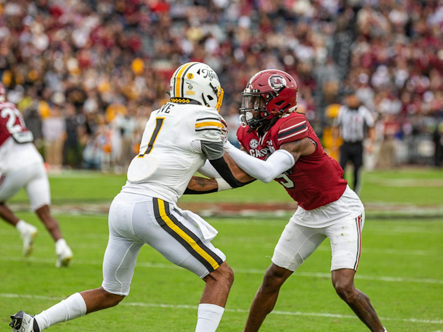 Redshirt junior Cam Smith (on right) holds back a Missouri wide receiver during the South Carolina and Missouri matchup on Oct. 29, 2022. Missouri beat the Gamecocks 23-10.