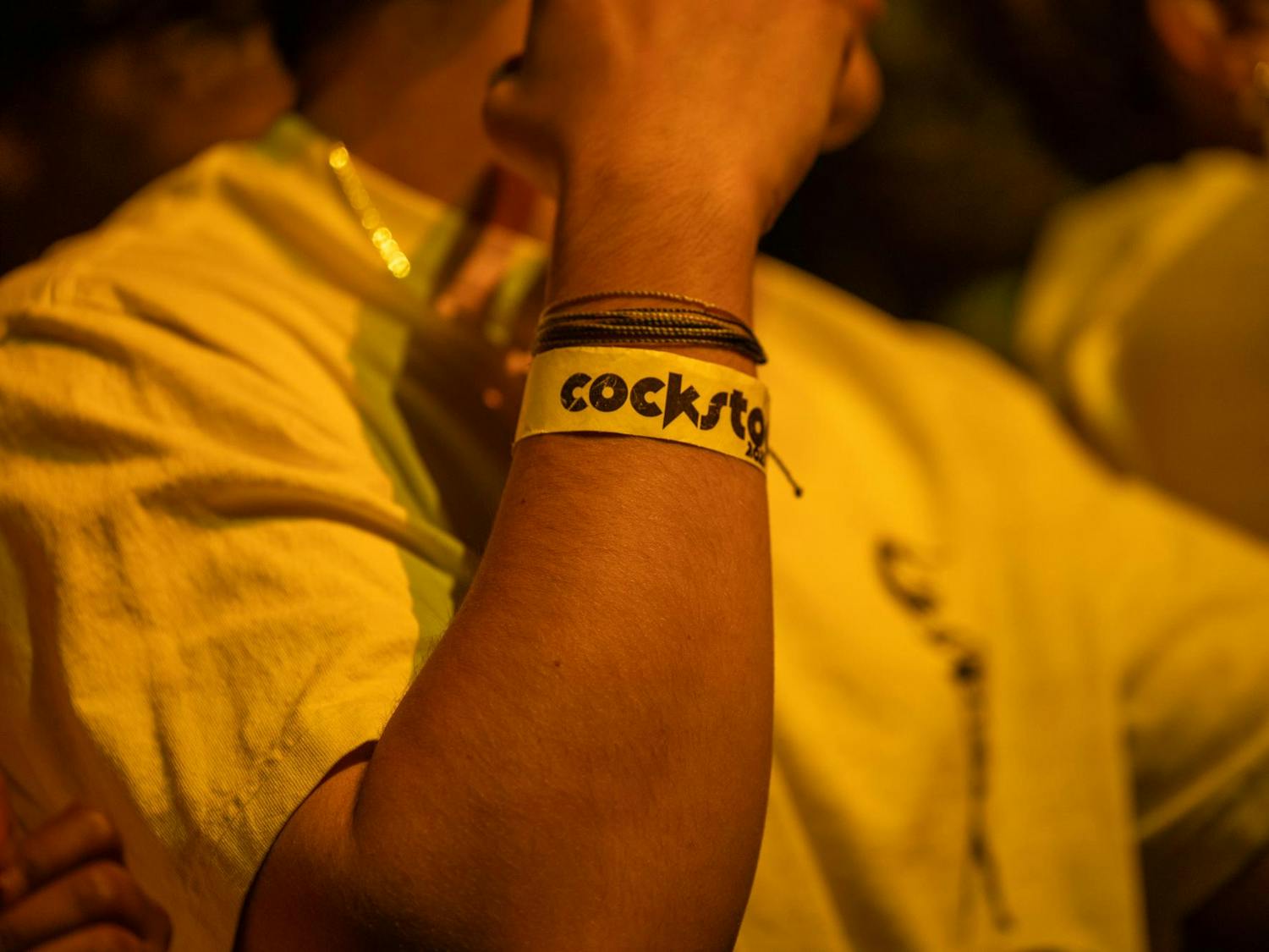 A University of South Carolina student wears a wristband reading "Cockstock" on it during the annual concert for students on Jan. 29, 2025. The event, which usually takes place during Homecoming week in October, was moved to January.