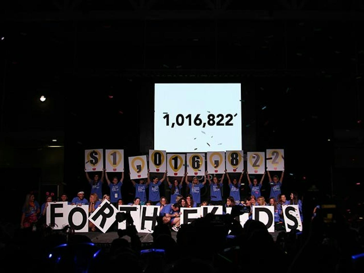 &nbsp;Volunteers cheer and laugh while on stage presenting the amount of money that the organizations of South Carolina raised for Dance Marathon.&nbsp;