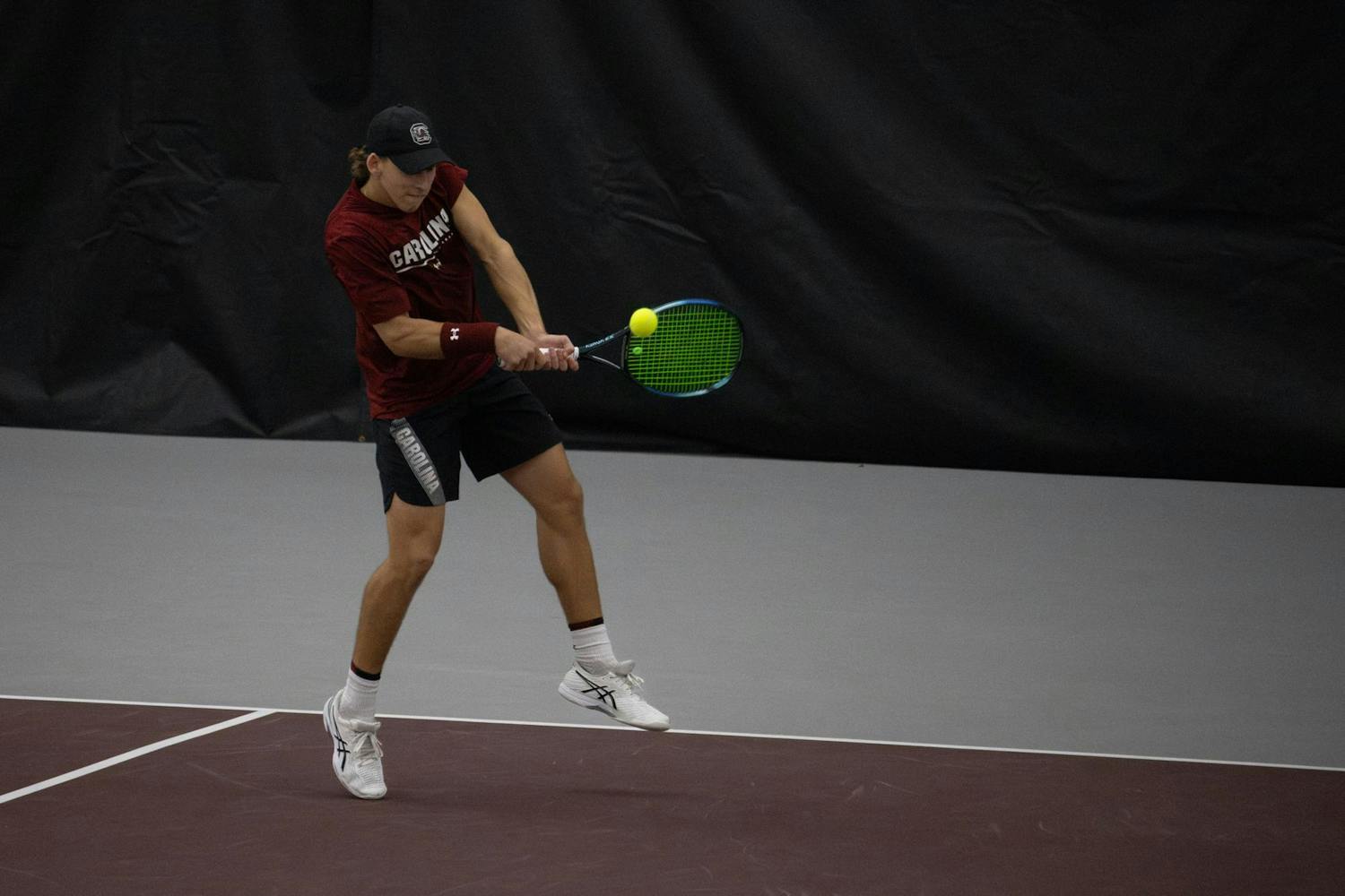 Junior Casey Hoole backhands the ball during South Carolina’s match against Clemson at the Carolina Indoor Tennis Center on Jan. 27, 2024. The Gamecocks beat the Tigers 4-2 in the rivalry matchup.