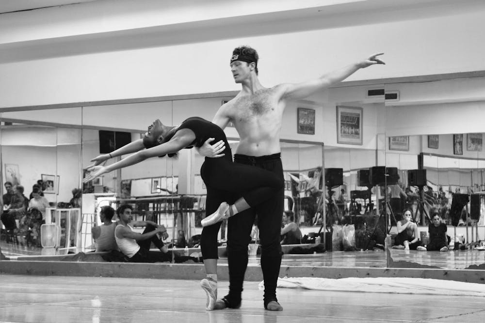 <p>South Carolina Ballet principal dancers Camilo Harrera and Joshua Van Dyke rehearse for their performance in "Off the Wall &amp; Onto the Stage: Dancing the Art of Jonathan Green." The company of the South Carolina Ballet will take the stage of the Township Auditorium on Sept. 27, 2024 at 7:30 p.m.</p>